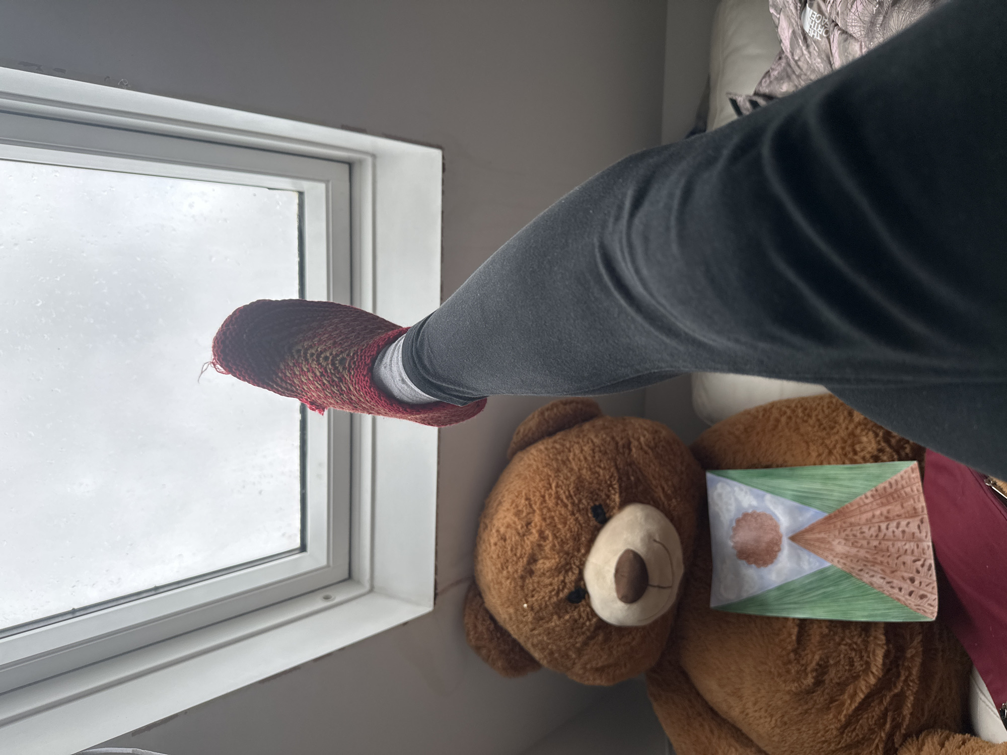 Woman documents rainy afternoon at home in Reading