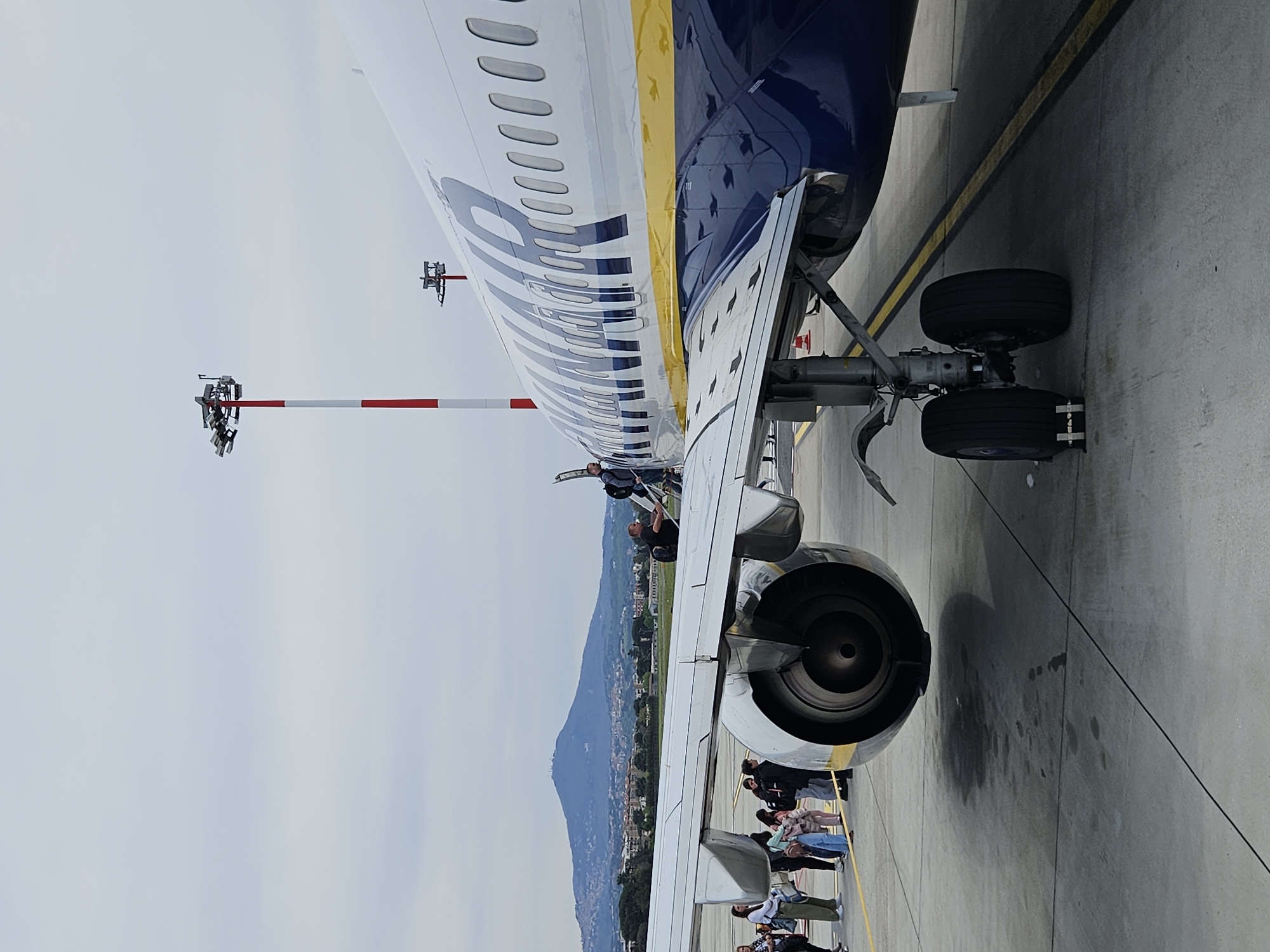 Ryanair passengers board aircraft at Rome airport Sunday morning