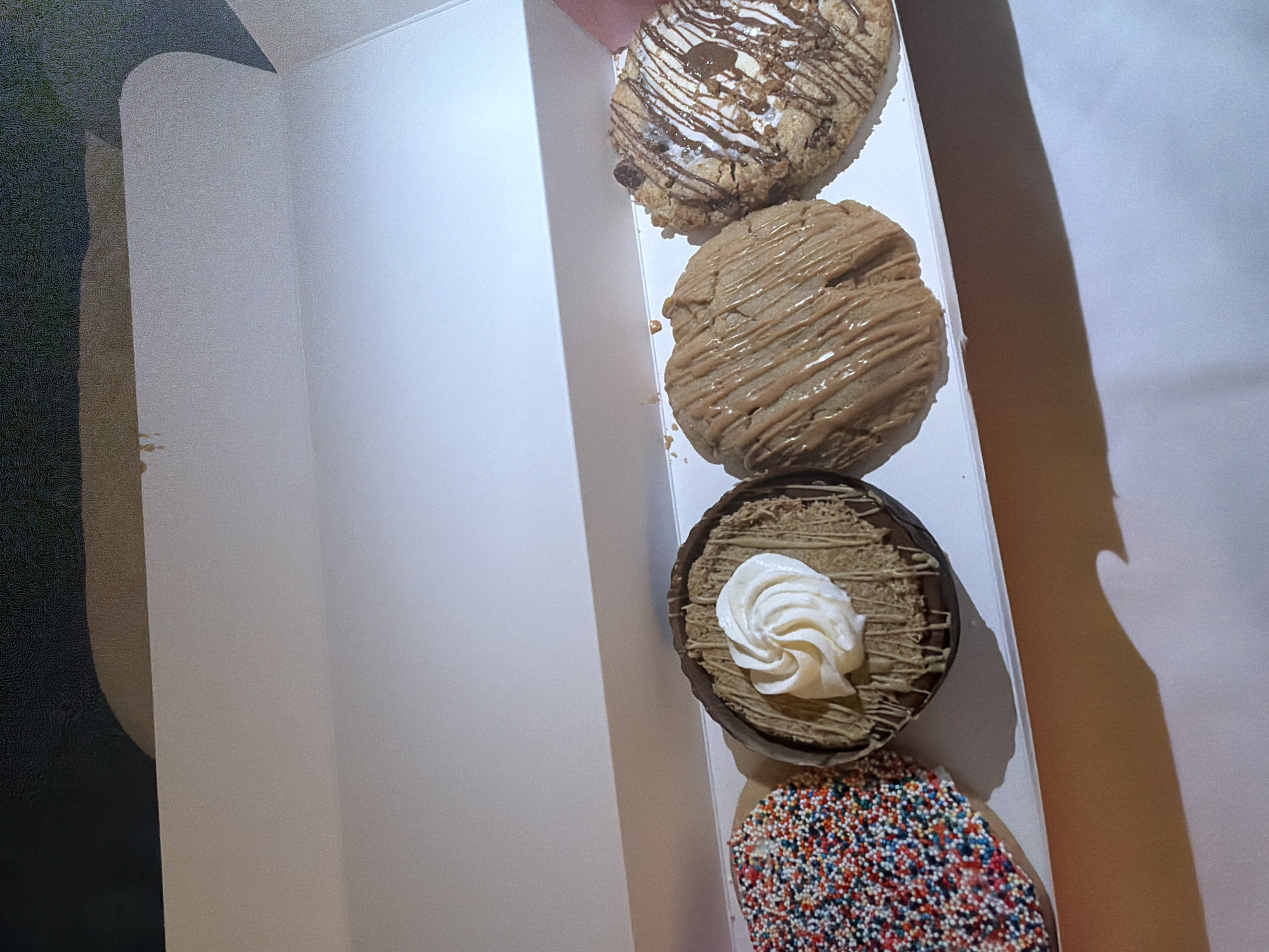 Late-night Crumbl cookie delivery documented in Toronto bedroom