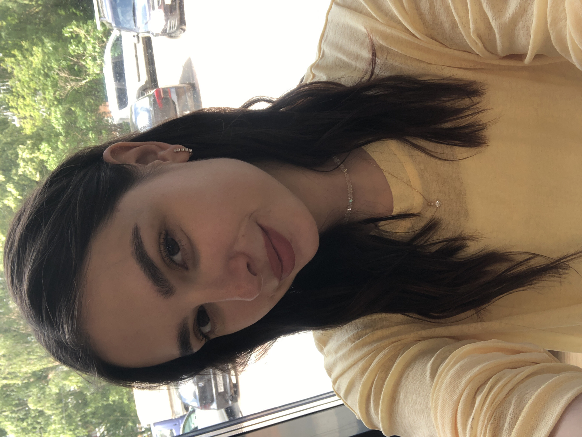 Café selfie session in Izhevsk, yellow top, multiple angles