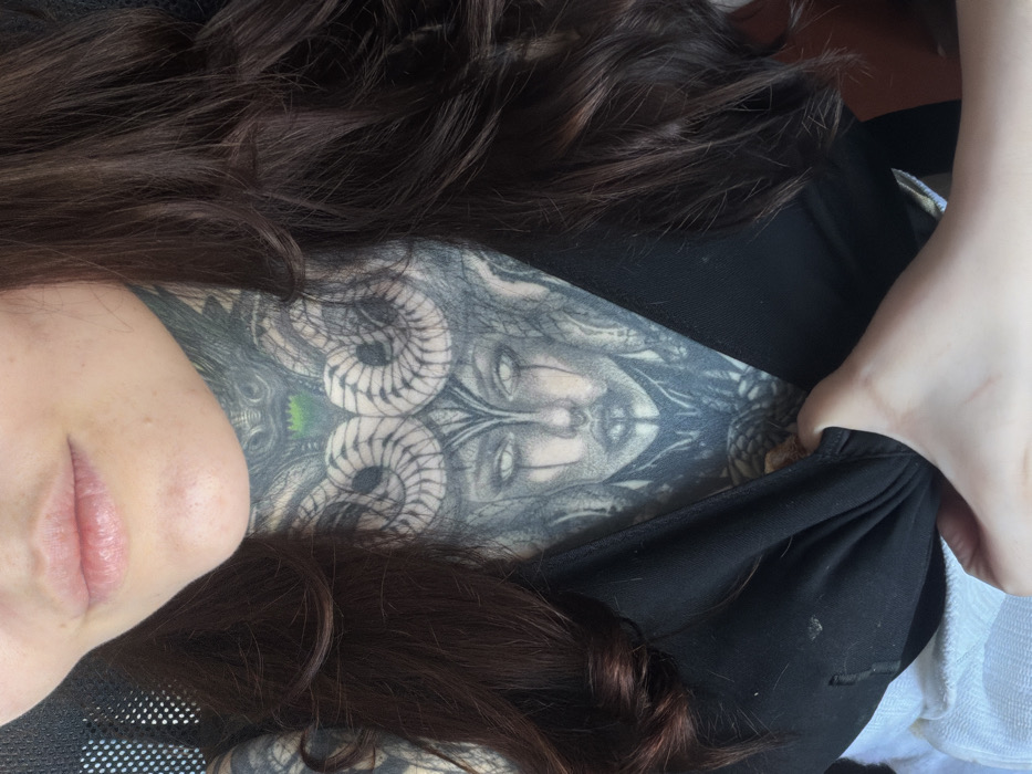 Tattooed woman photographed repeatedly in Chaikovsky, Russia morning session