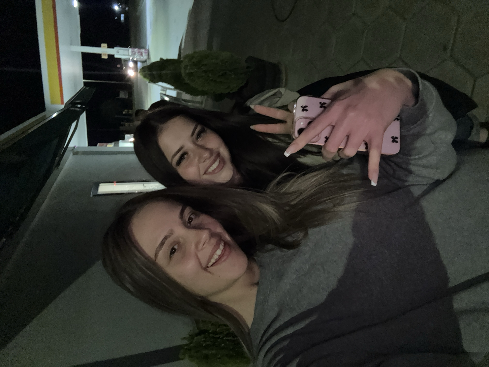 Young Women Take Selfies at Bulgarian Gas Station