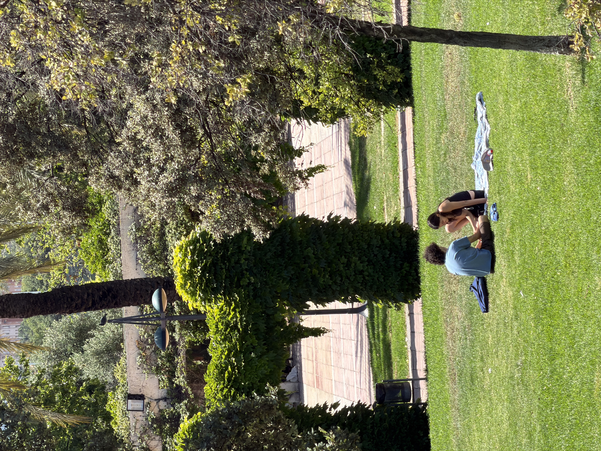 Sunny afternoon park life and streetscapes in Alboraia, Spain