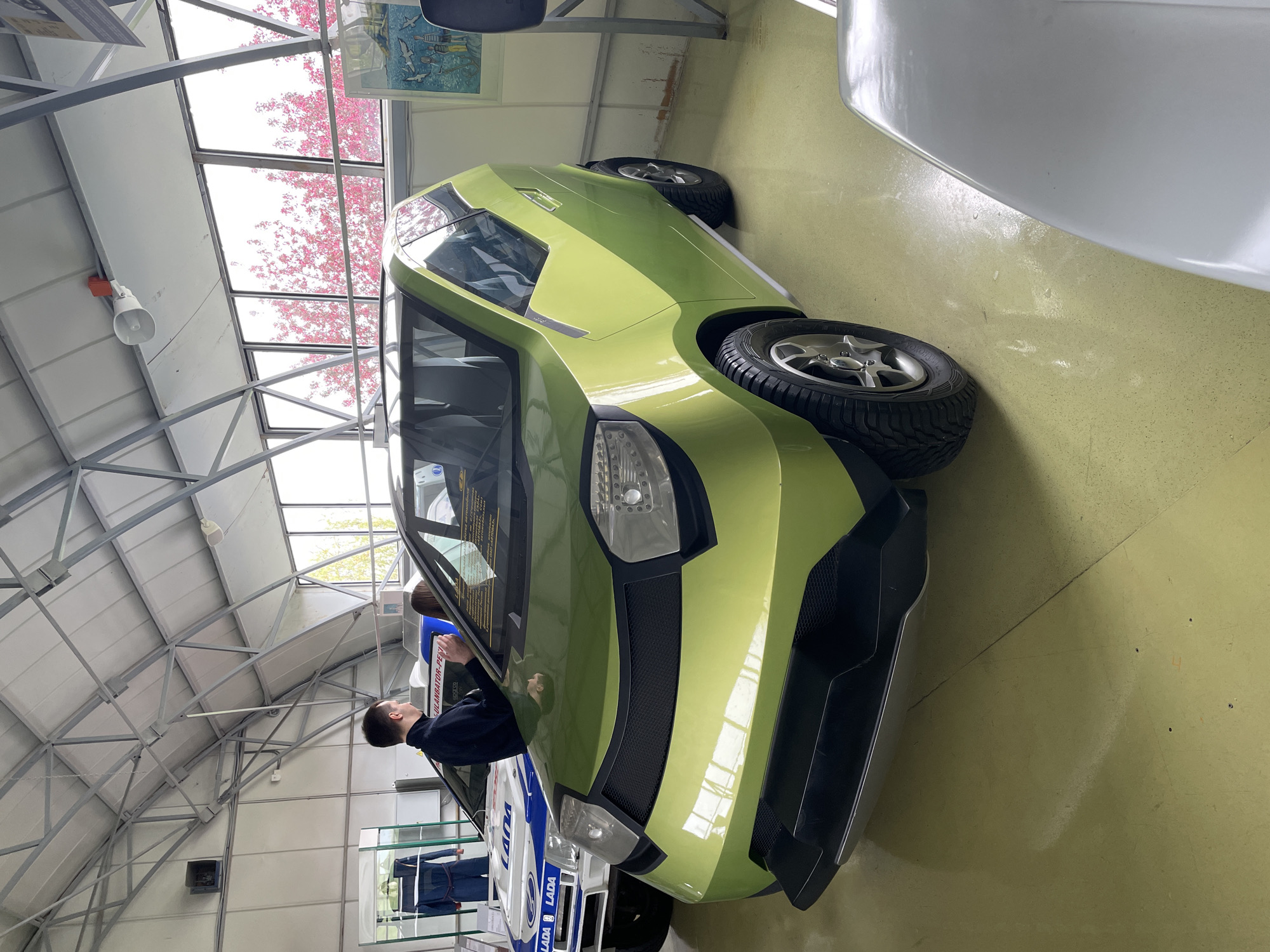 Visitor documents Lada museum and military exhibits in Tolyatti