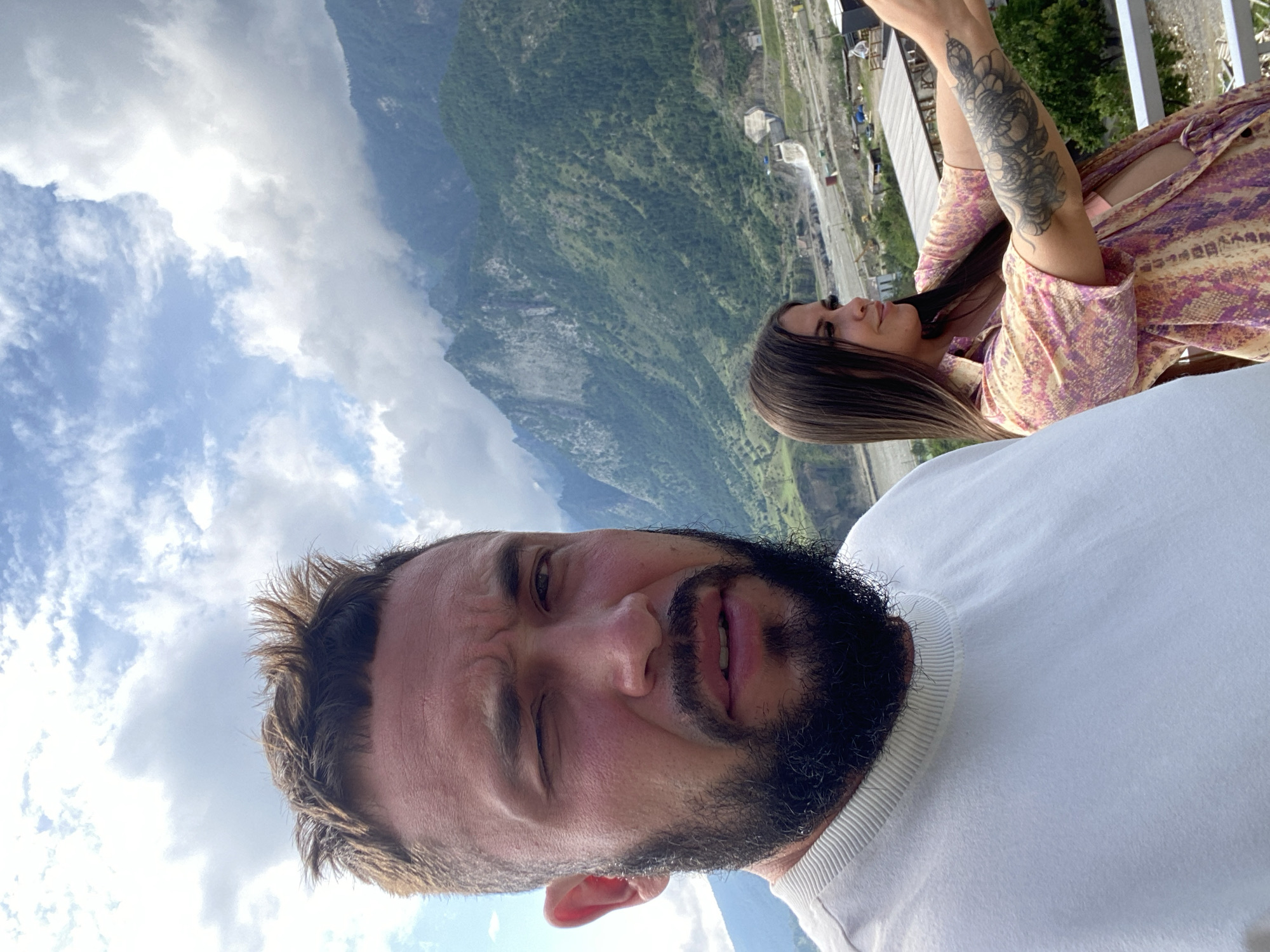 Selfies and downtime against a Caucasus mountain backdrop