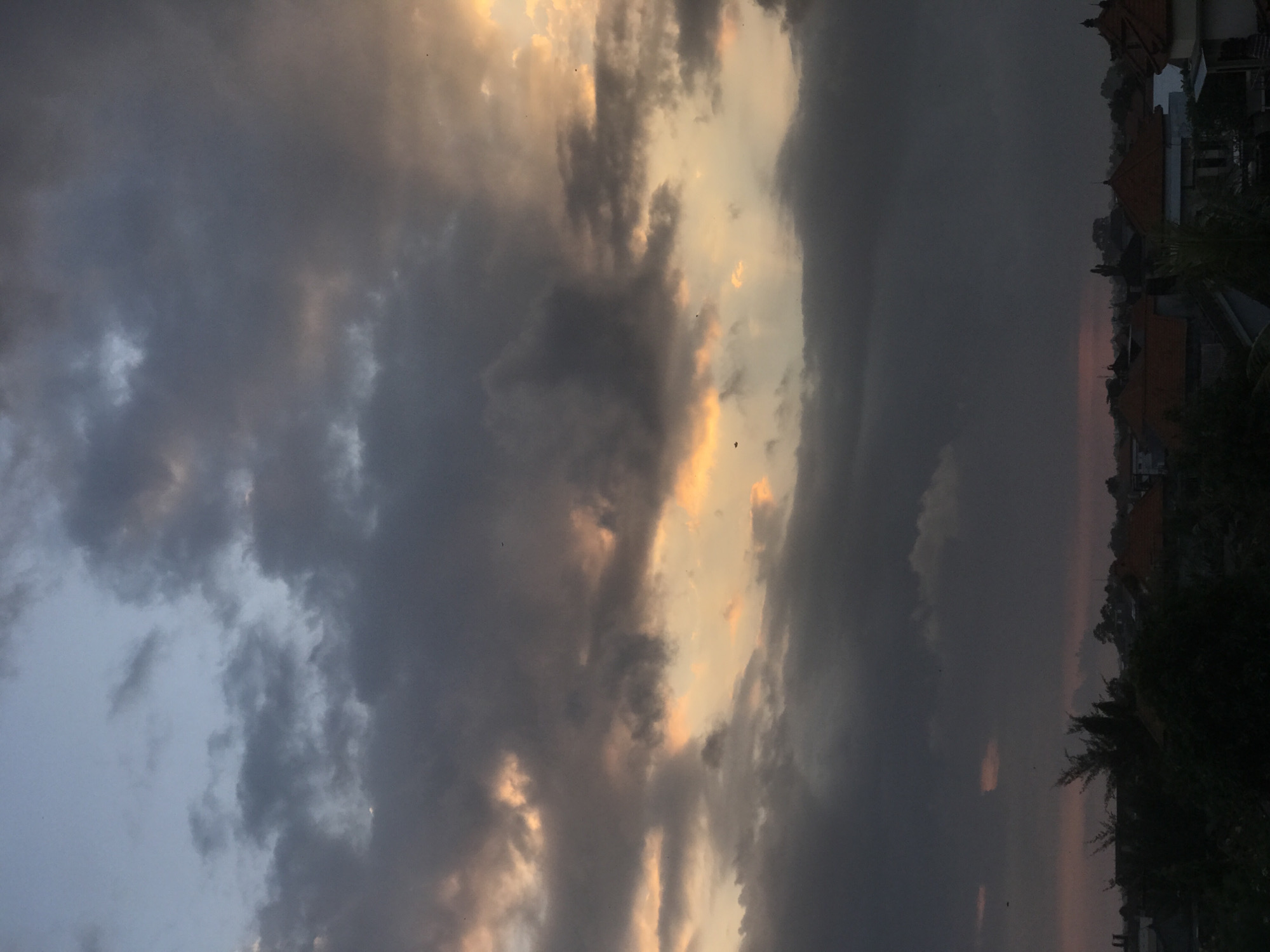 Dramatic sunrise clouds blanket North Kuta, Indonesia