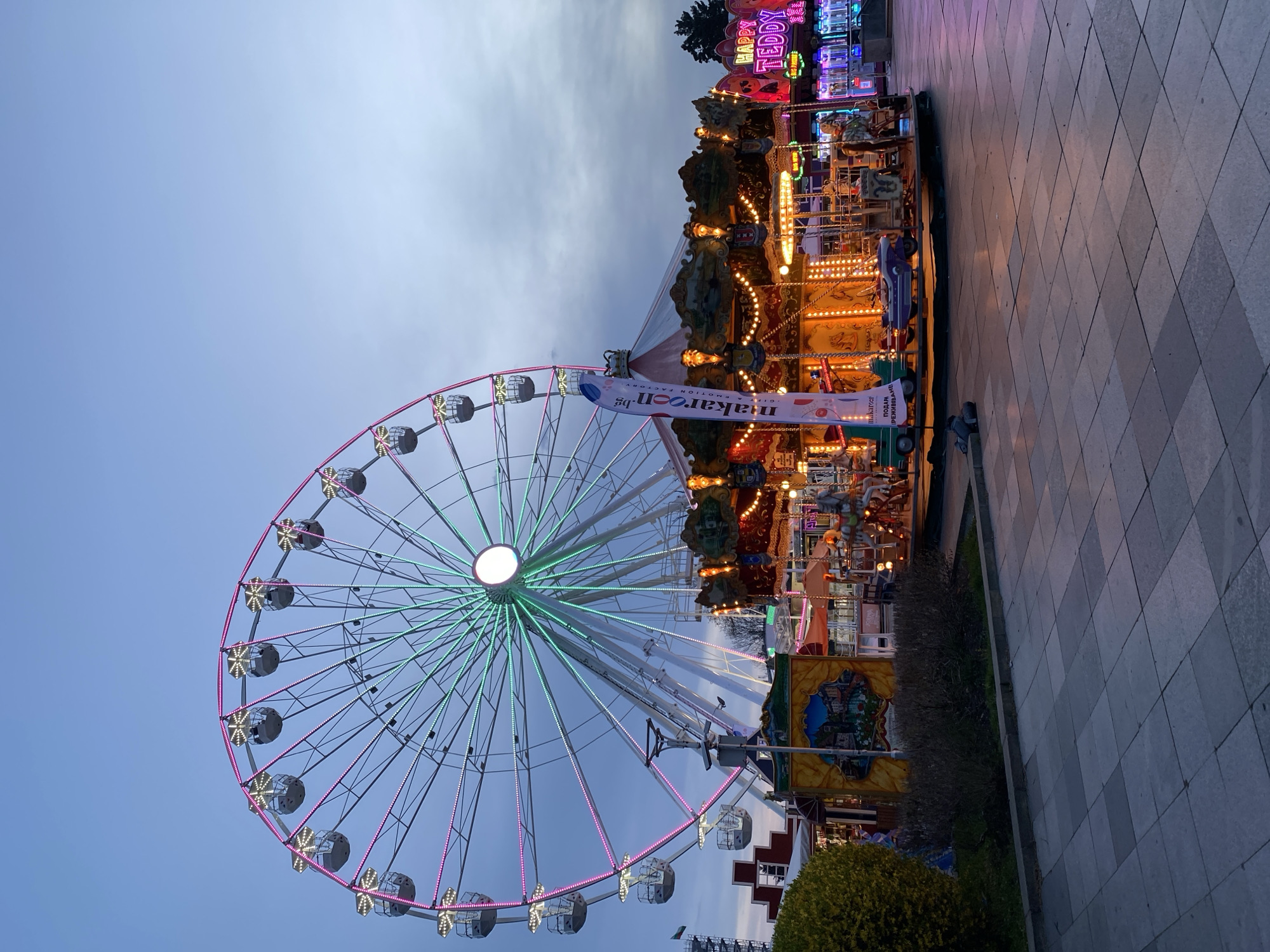 Evening Ferris wheel ride captures Sofia cityscape, police presence