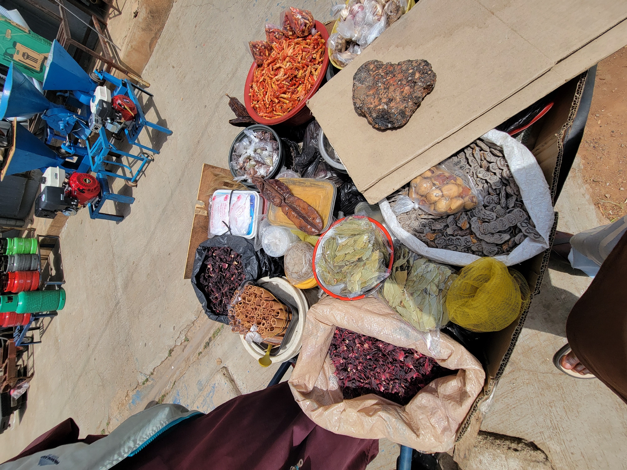 Woman with package spotted near bustling Jos market