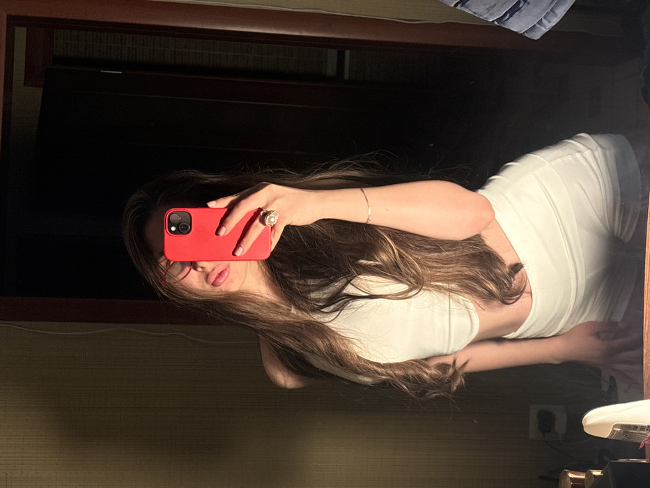 Woman Takes Mirror Selfies in Krasnodar Bedroom