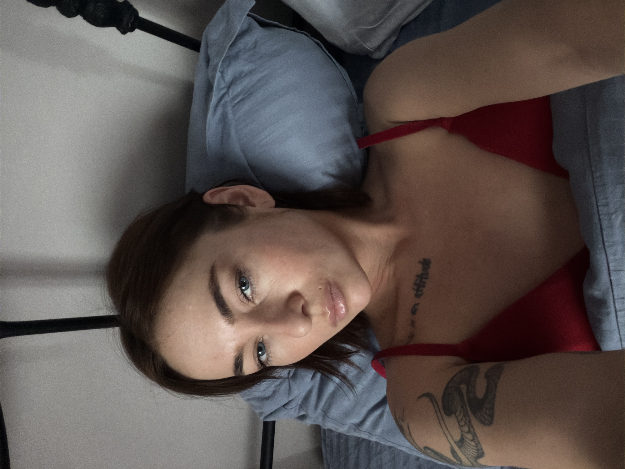 Woman resting on bed observed in Ust-Ilimsk