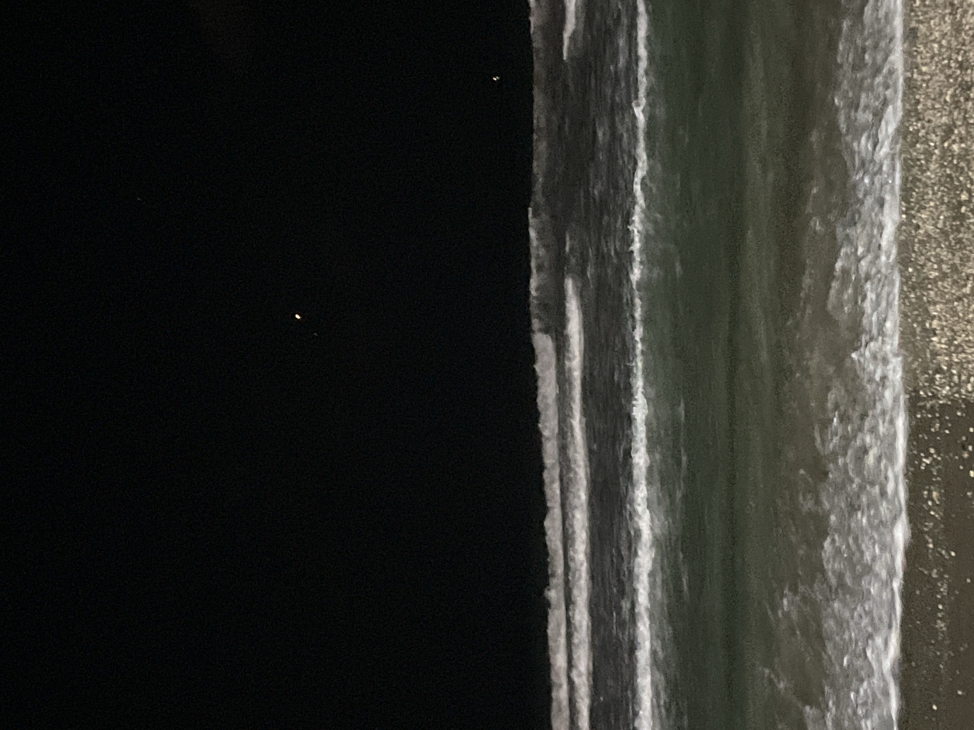 Night at the Herzliya beachfront, waves and promenade