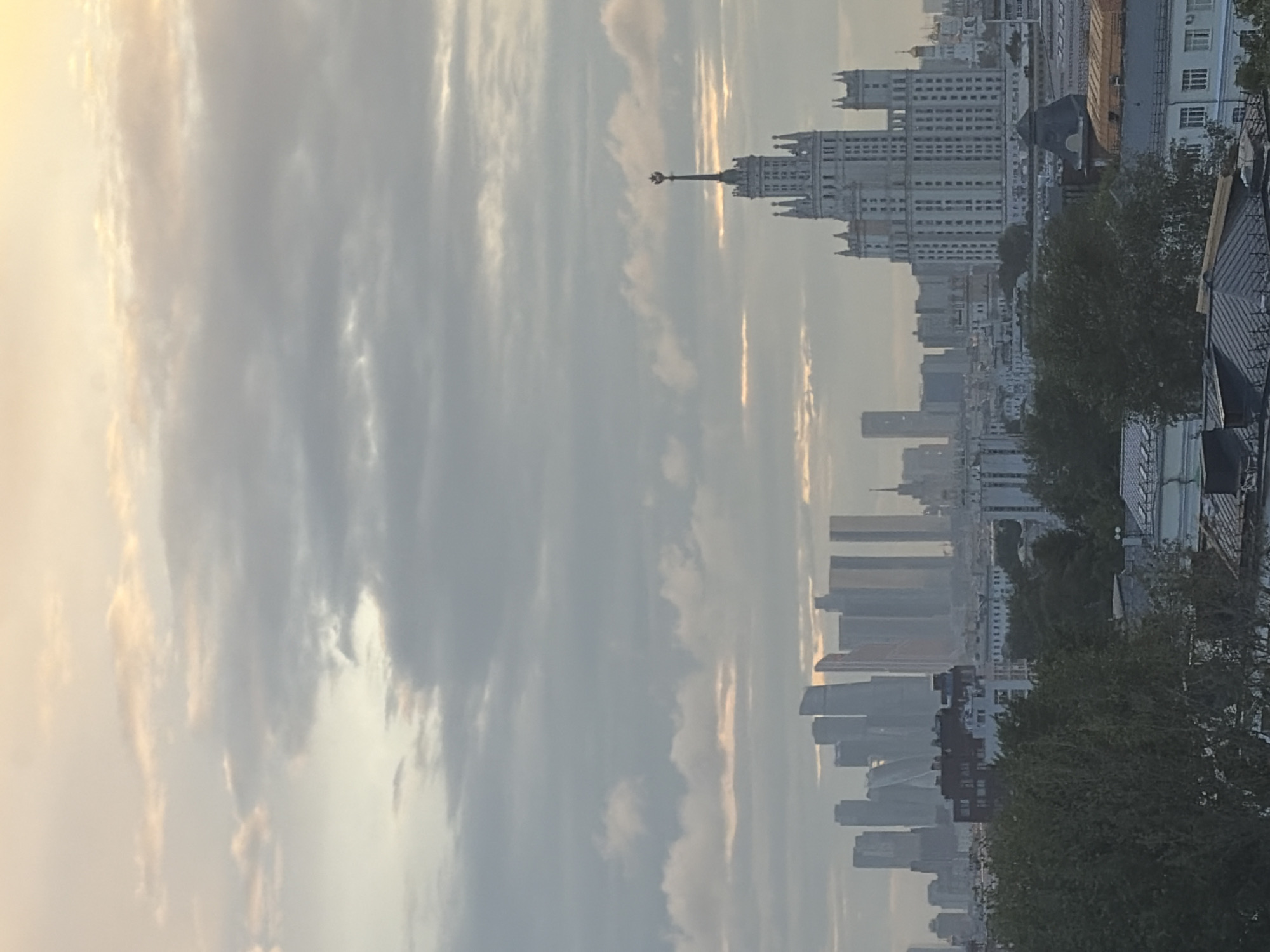 Moscow dusk skyline shots mixed with cosplay props and figurines