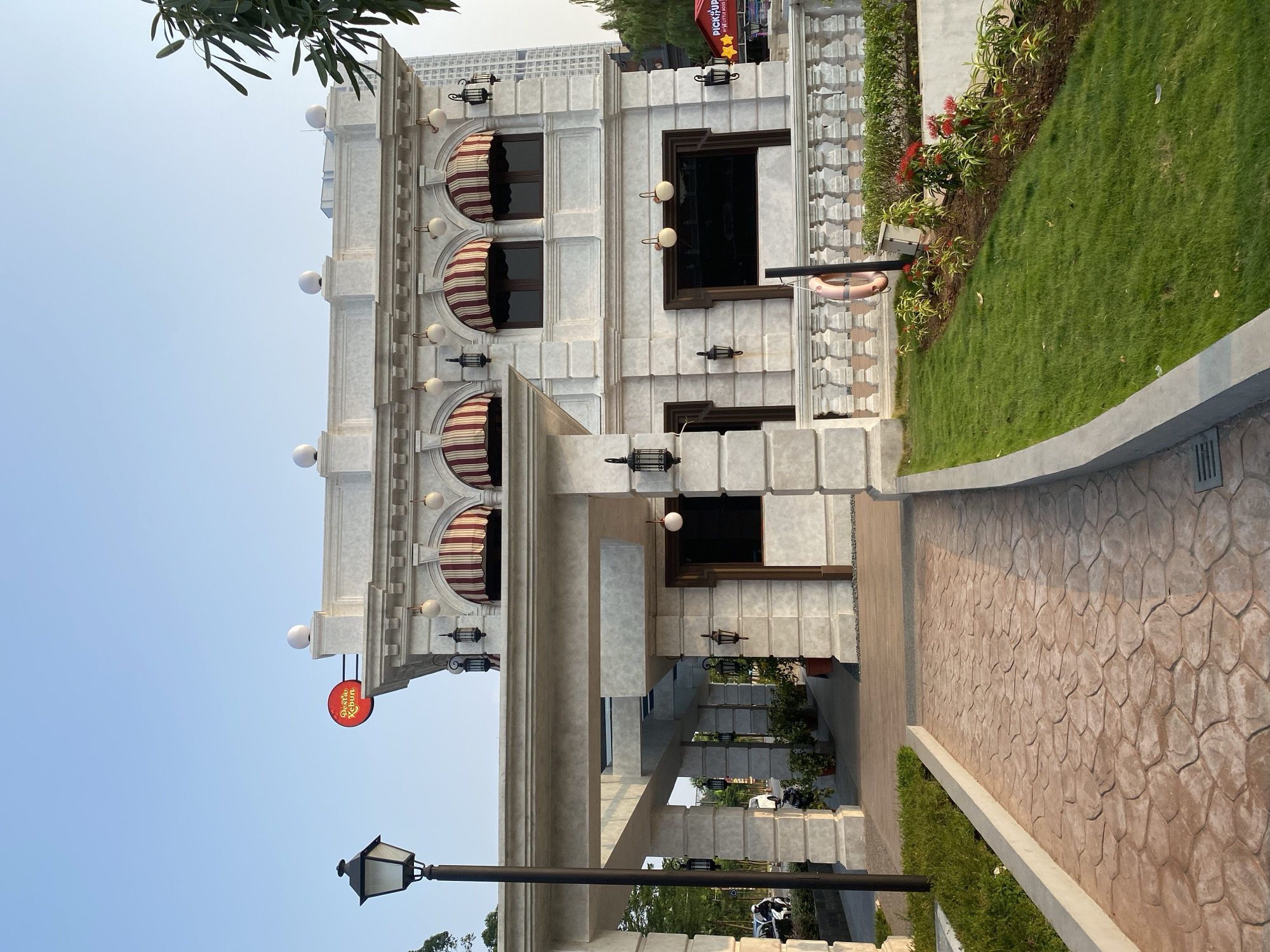 Morning walk through Grand Waterfront's canals, gardens, and commercial strip