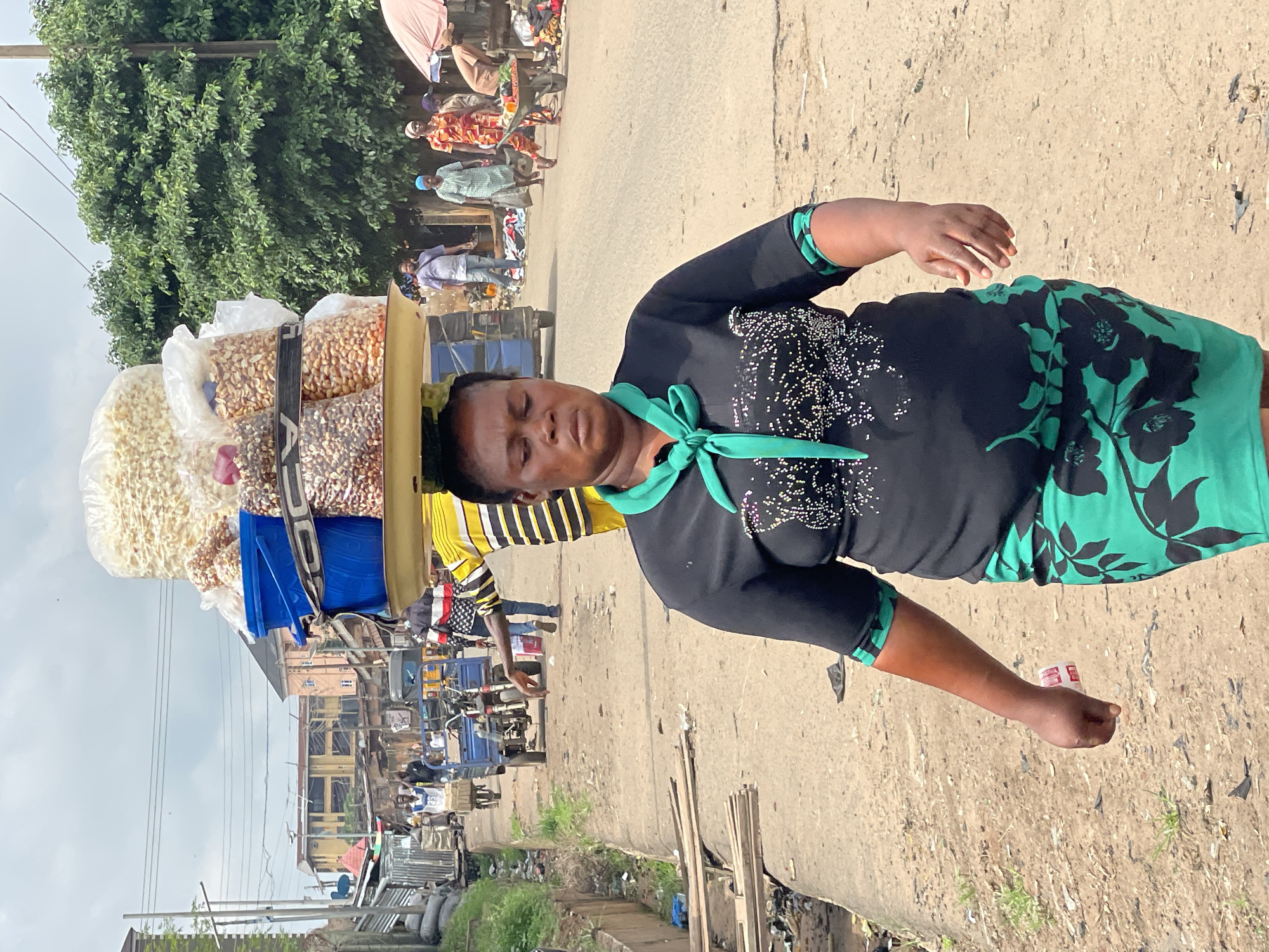 Street vendors and transport workers documented during morning commerce