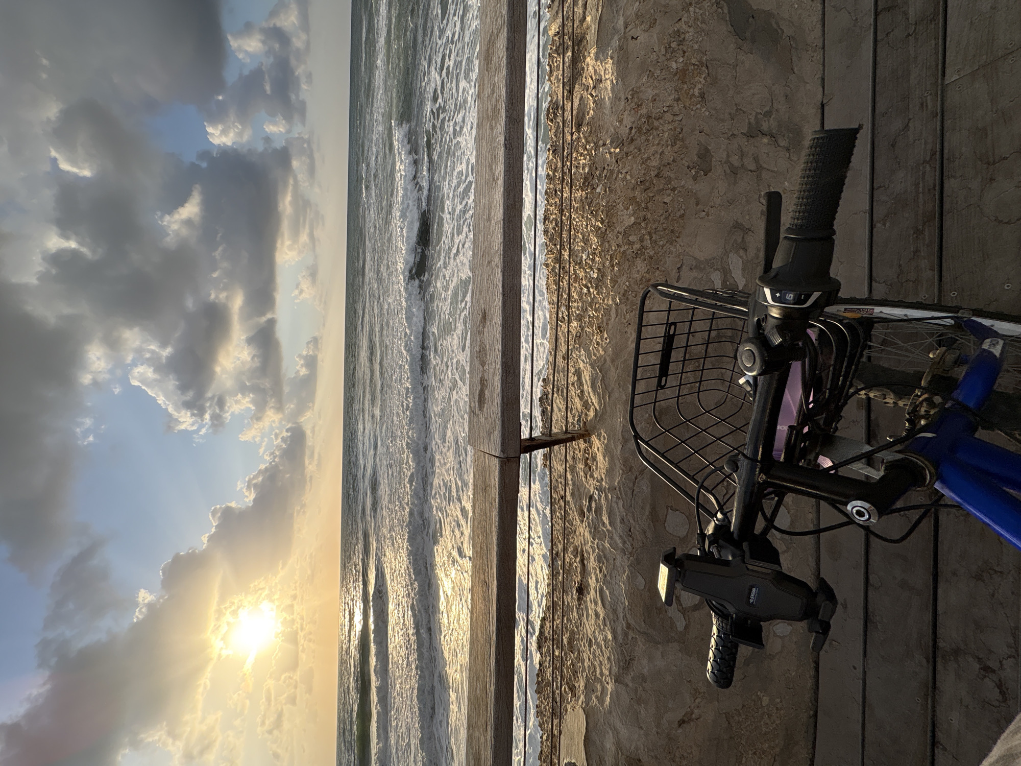 Coastal sunset scene with bicycle captured in Tel Aviv
