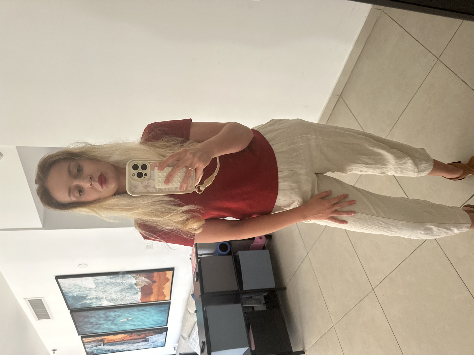 Mirror selfie and hallway shot inside a Petah Tikva apartment