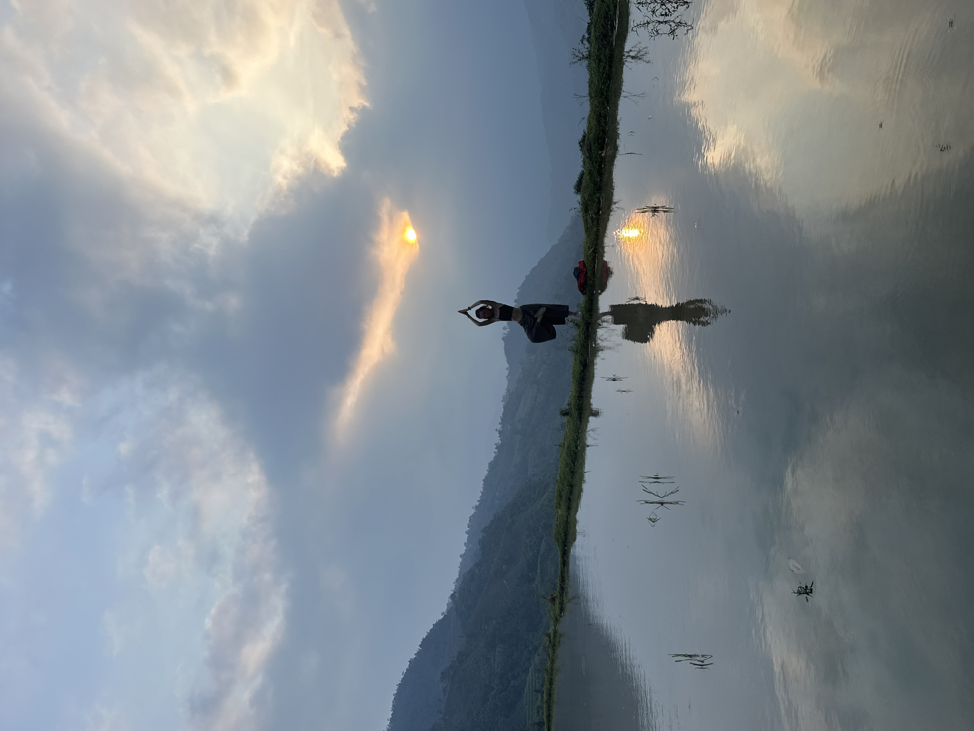 Tourists photograph sunset moments at Vietnam rice terraces