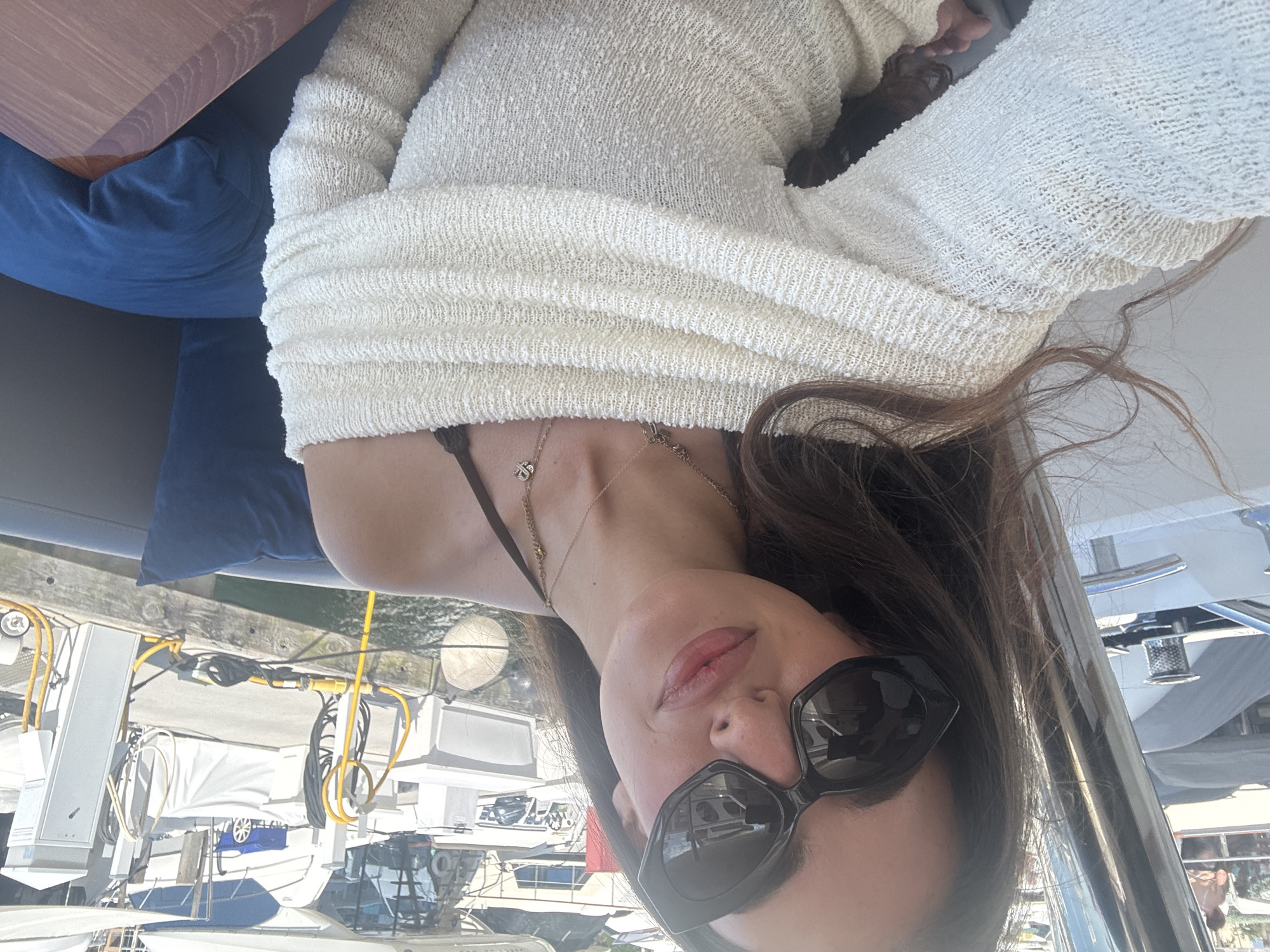 Woman in cream sweater spotted at Miami Beach marina