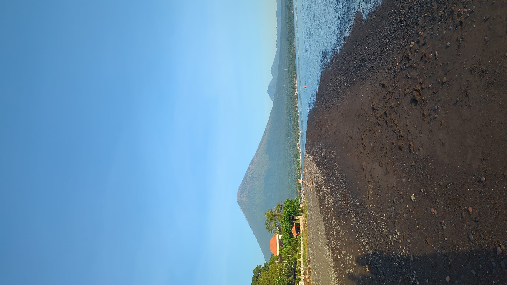 Coastal scenes captured in Abang, Indonesia show beach and seaside residence
