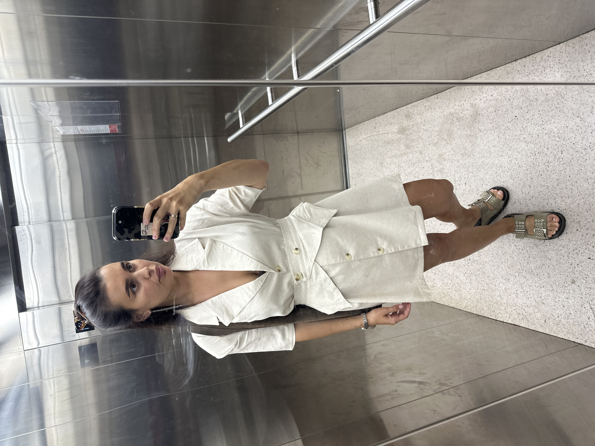 Casual selfies and family snapshots inside a Perm apartment building.