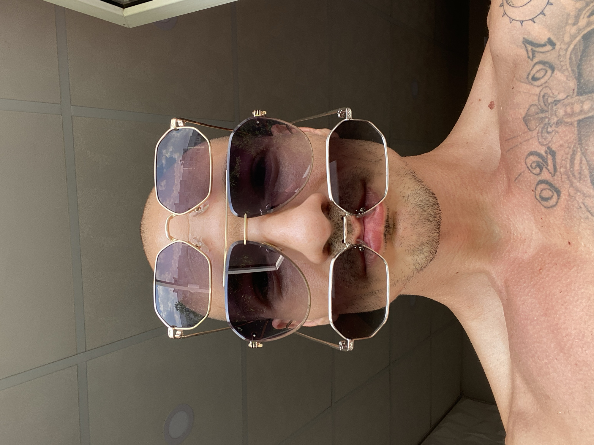 Three pairs of stacked sunglasses, two angles, Pleven
