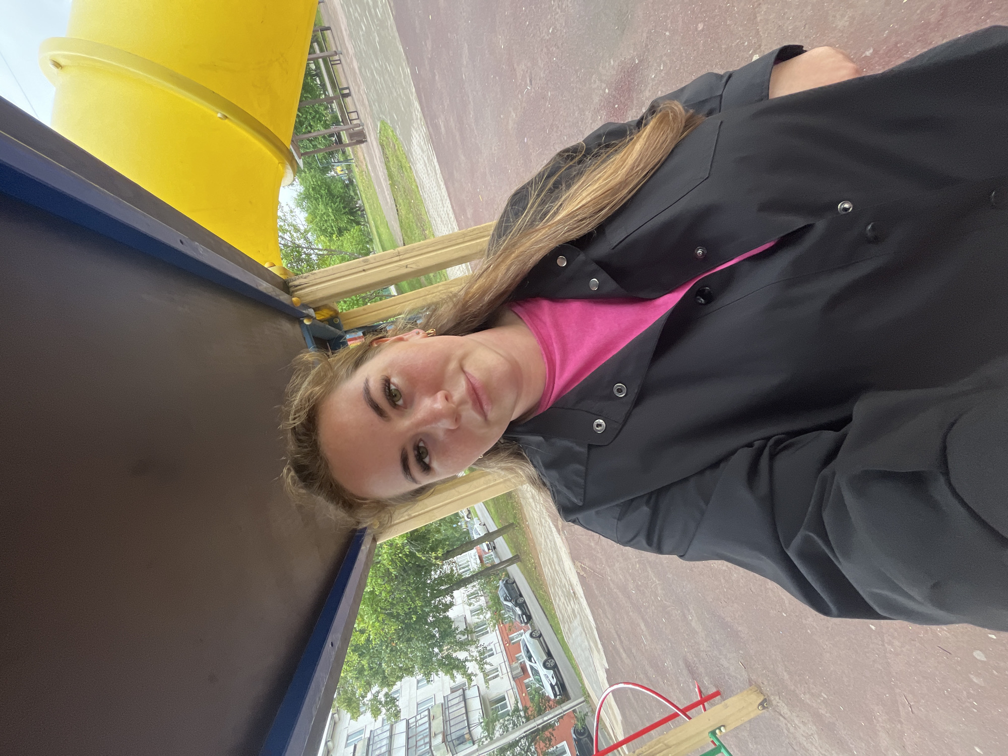 Afternoon at a Chaikovsky park: pigeons, playground, a toddler out