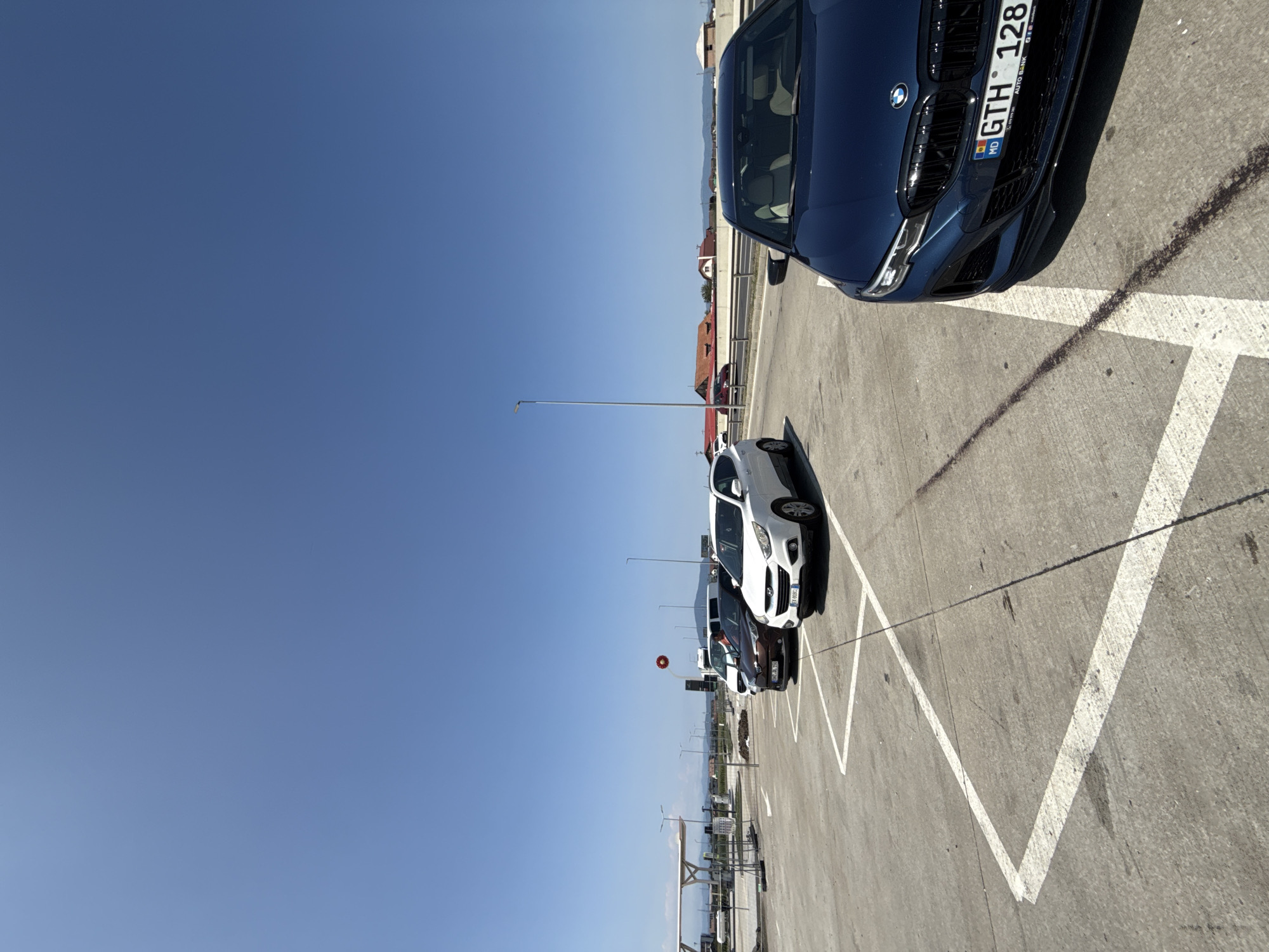 Quick stop at a sunny truck lot in Sanpetru, Romania