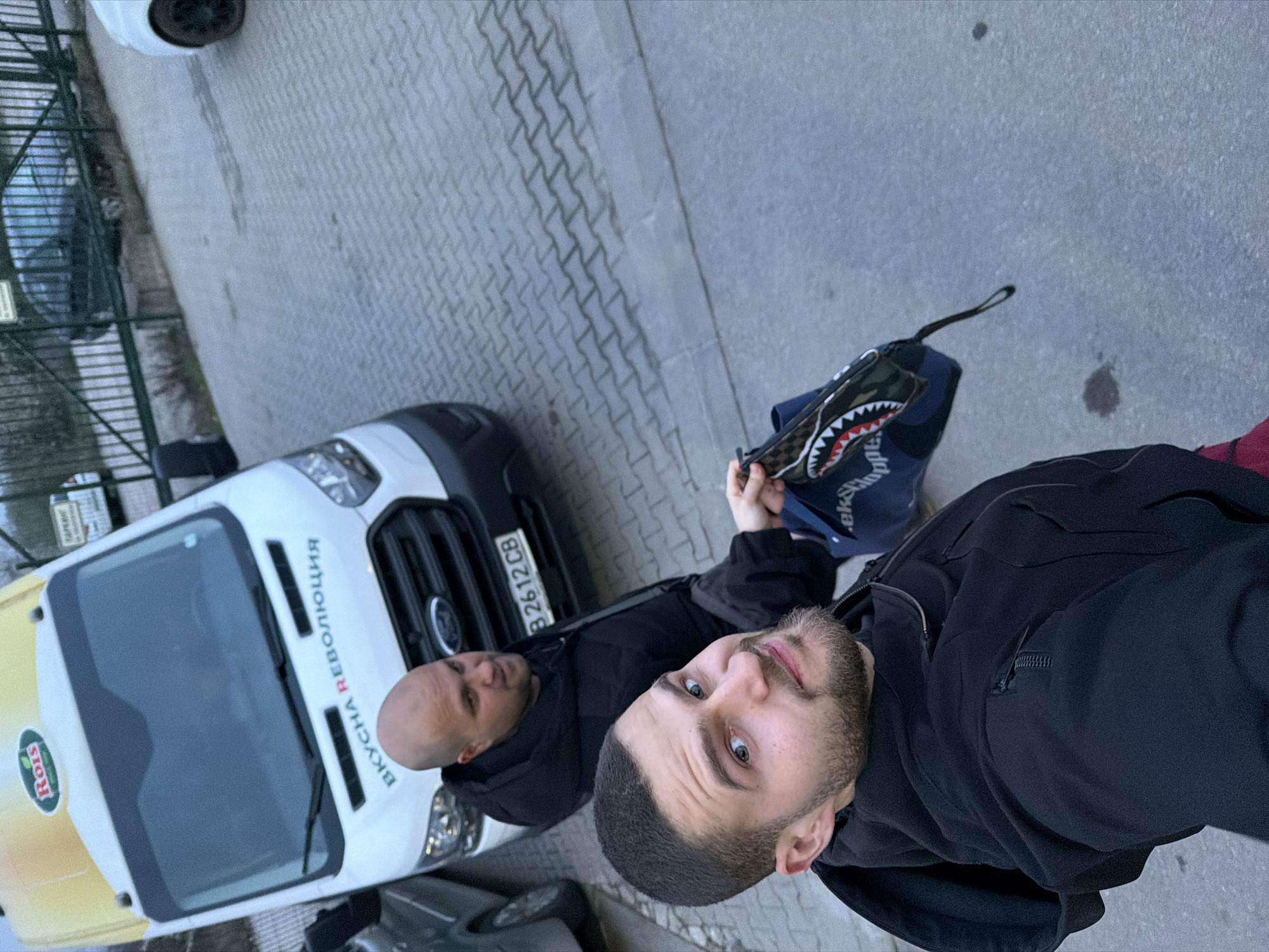 Two men with branded van in Lozen Bulgaria