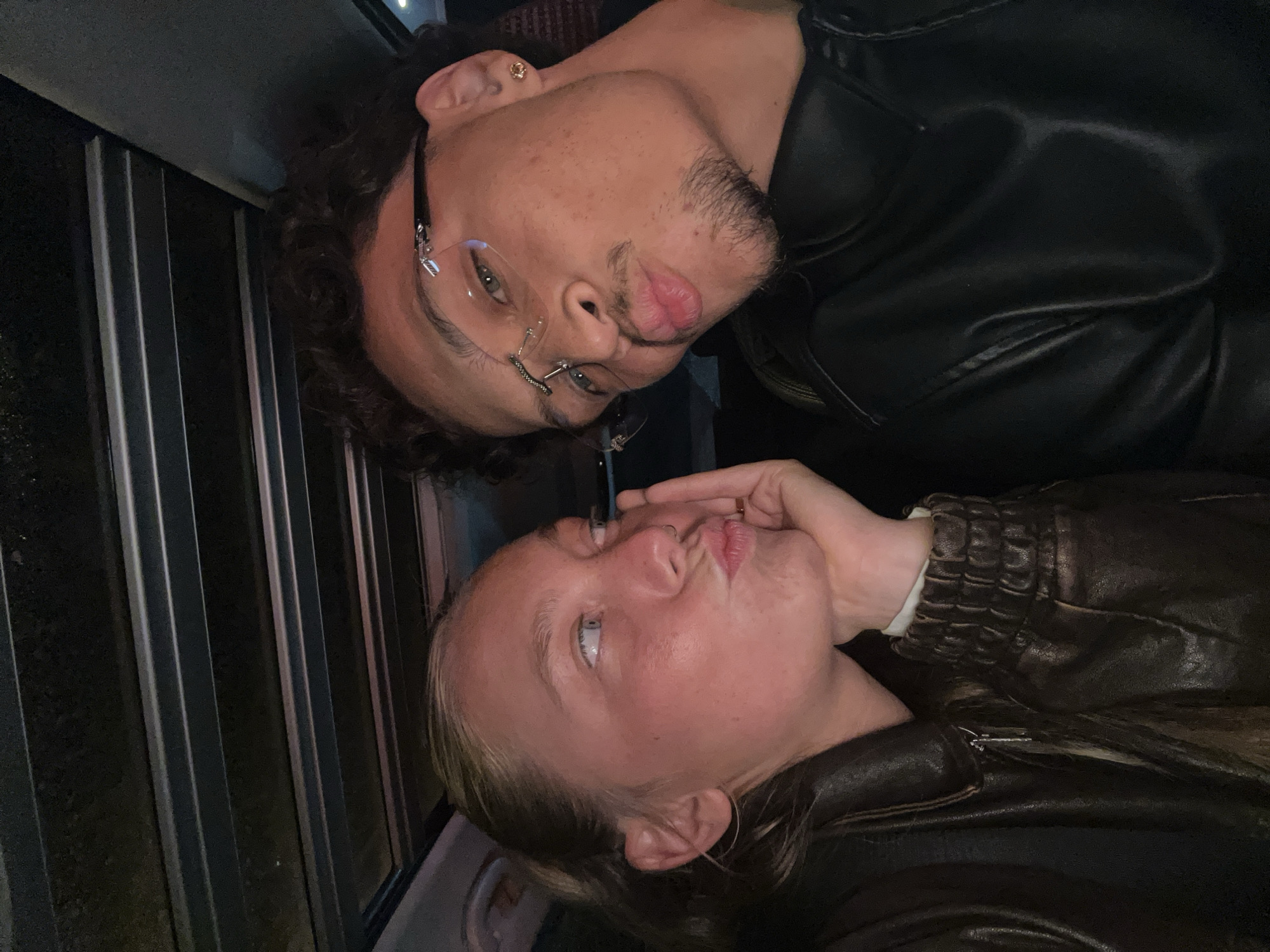 Couple captures car selfies in Noisy-le-Grand, wedding rings visible
