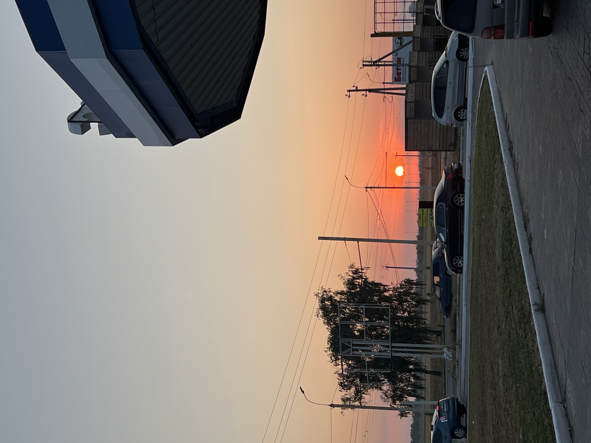 Sunset over a gas station in Ternovka, Moldova