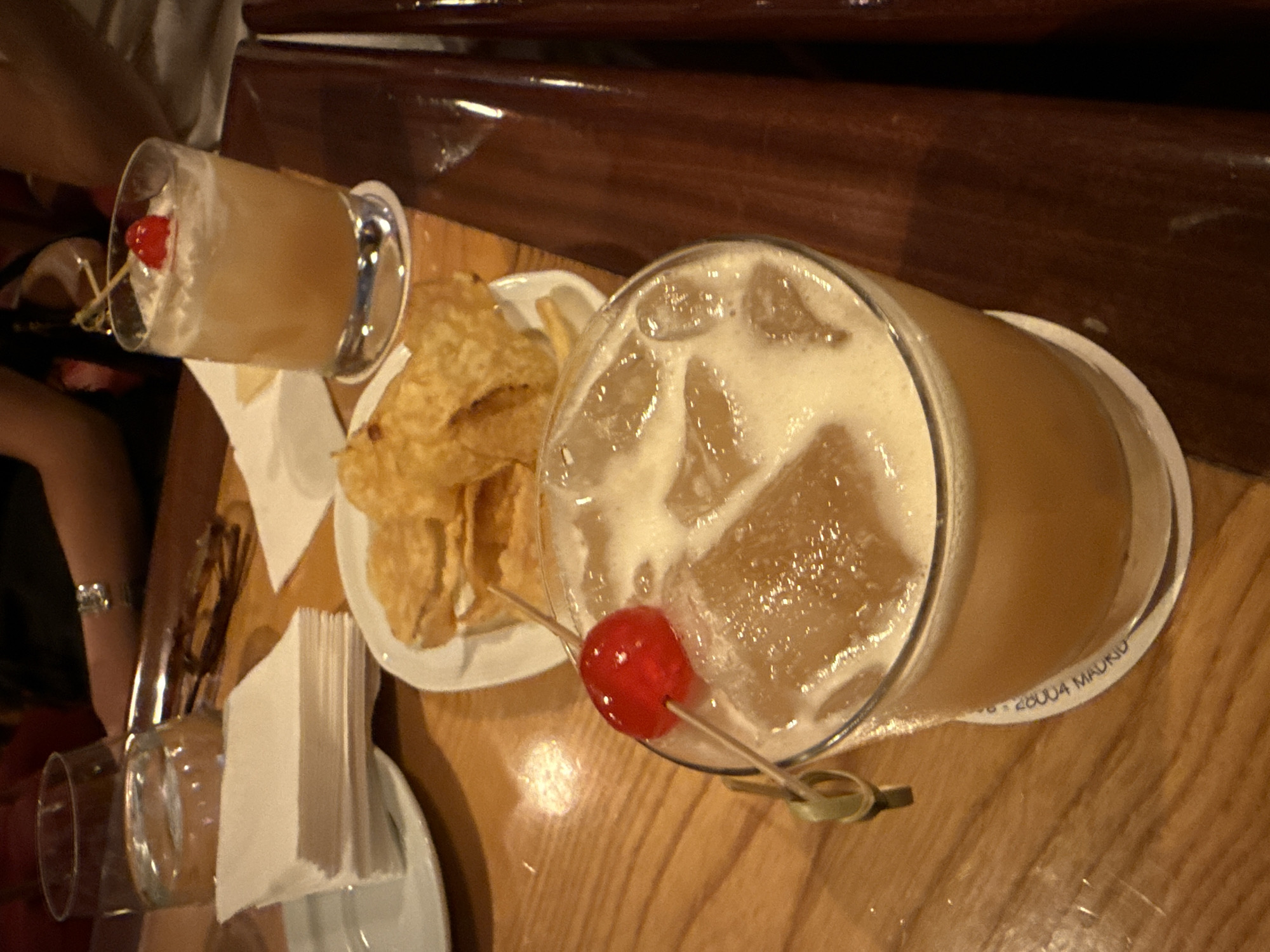 Cocktails and chips documented at Madrid dining scene