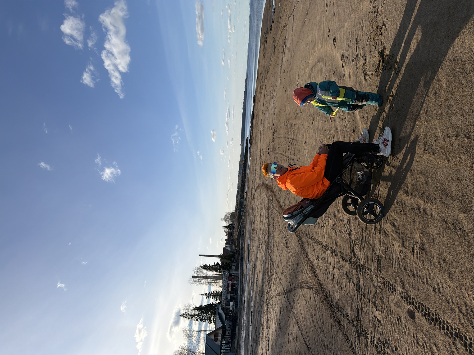 Family enjoys spring beach outing in Chaikovsky, Russia