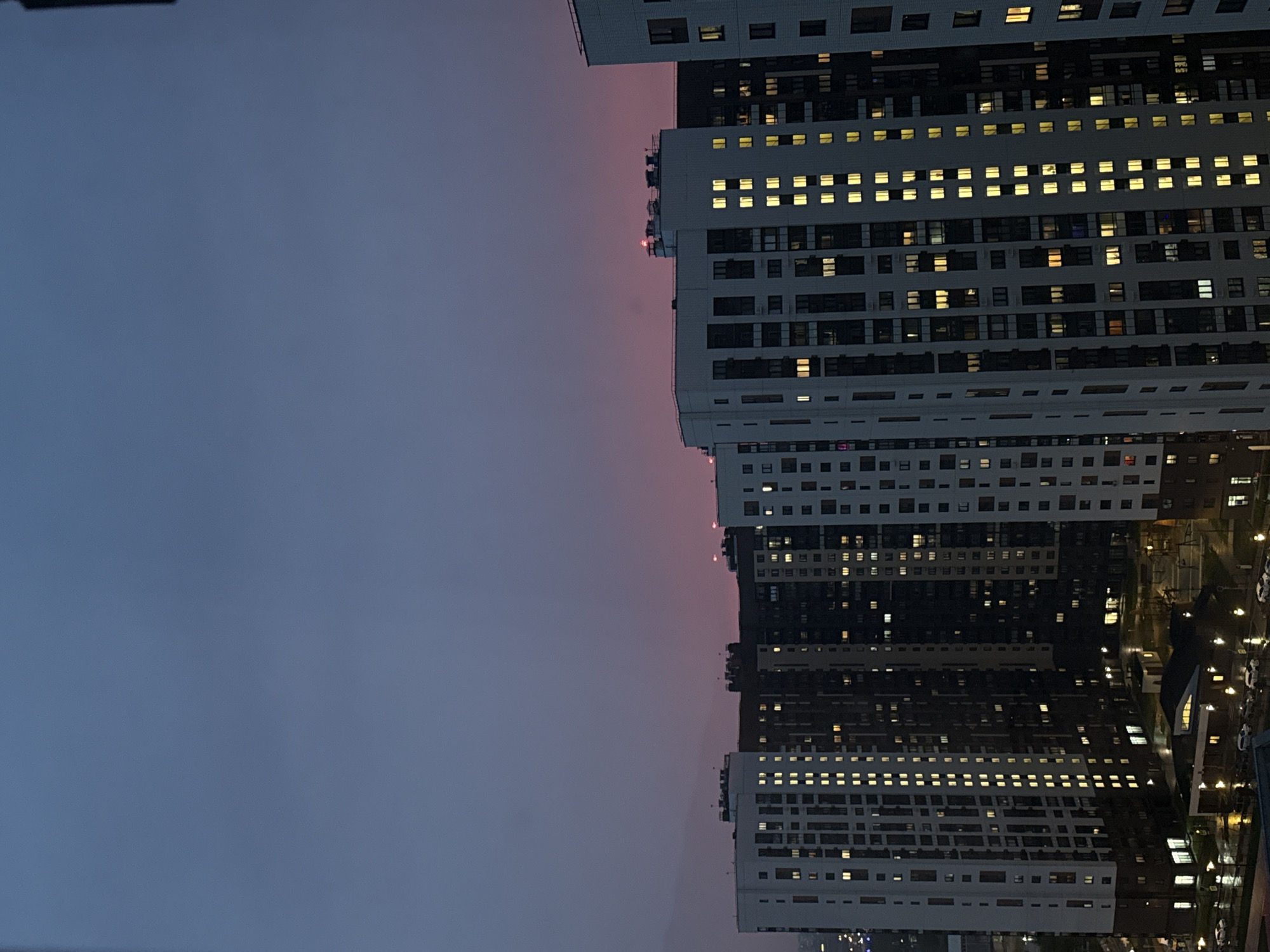 Evening lights illuminate Lyubertsy apartment towers