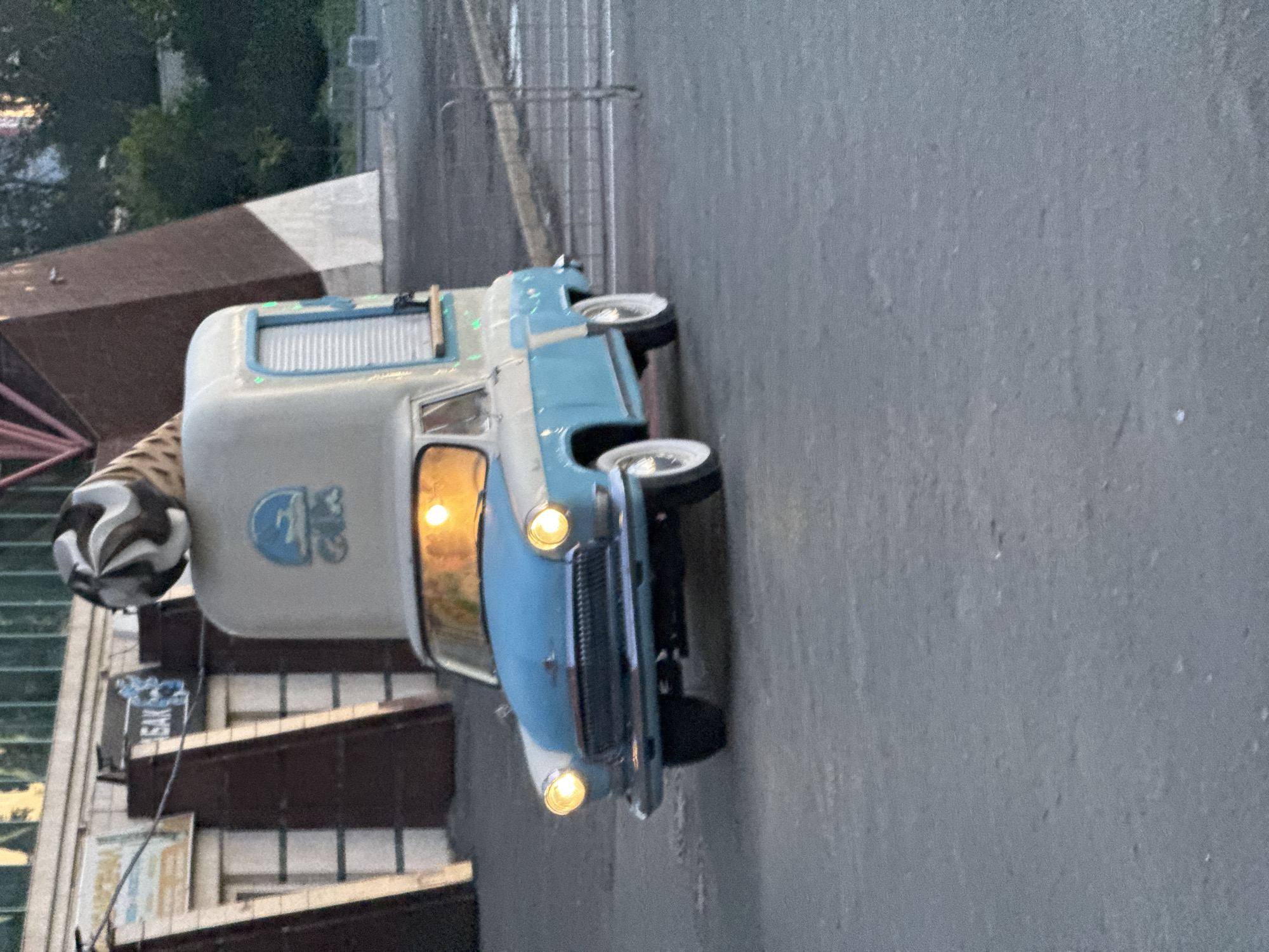 Evening scenes across Yekaterinburg streets, trucks, and apartment blocks