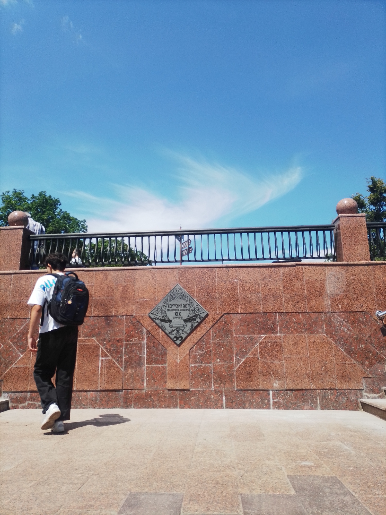 Busy summer morning around Poltava's central park and monument