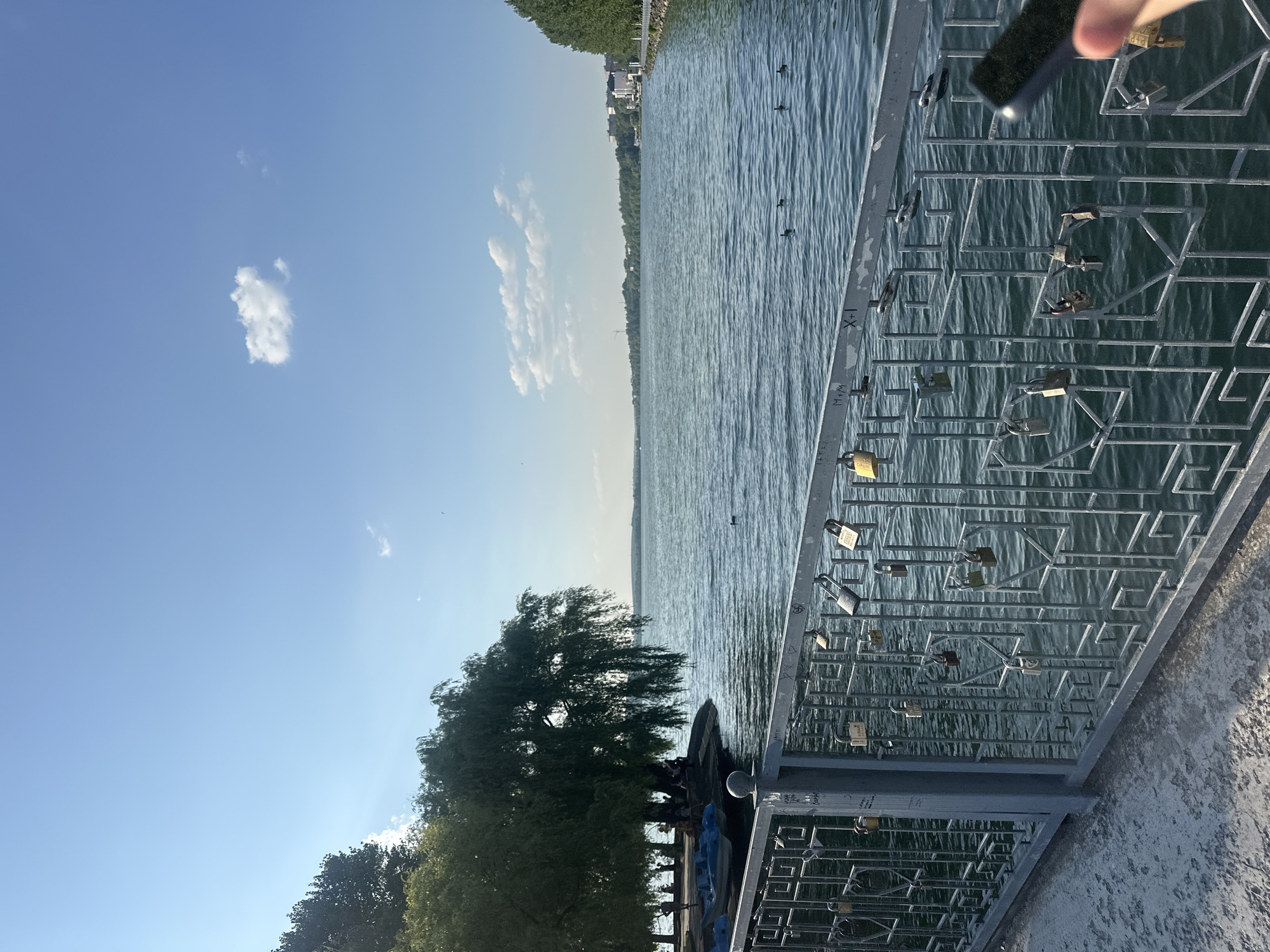 Summer afternoon at Ternopil Lake's busy lakeside promenade
