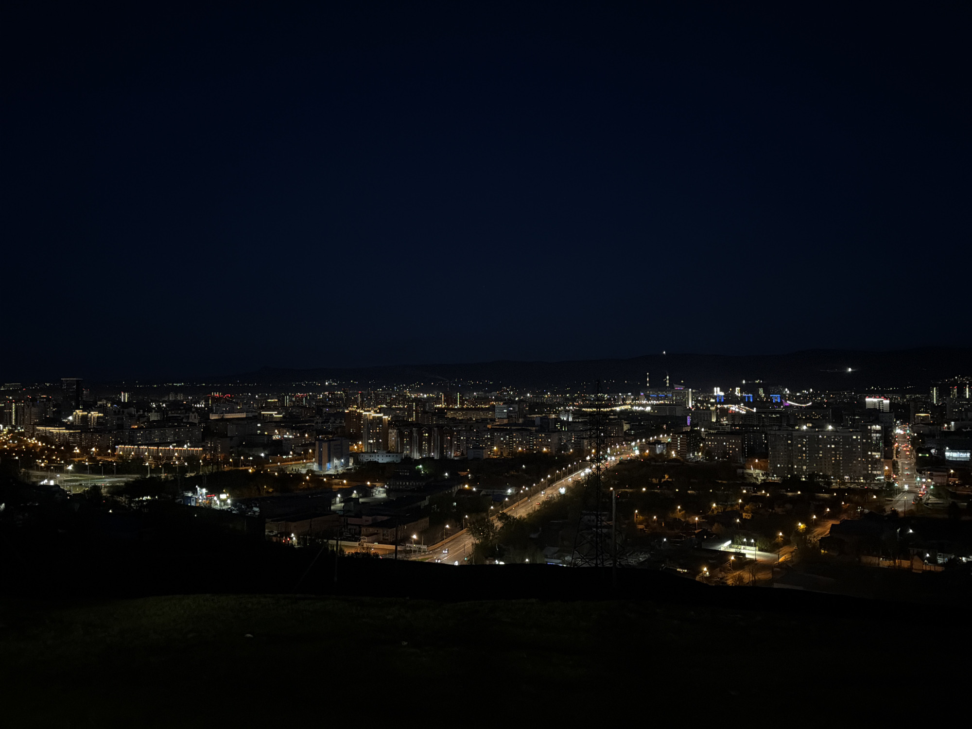Nighttime panoramic views captured of illuminated Krasnoyarsk cityscape