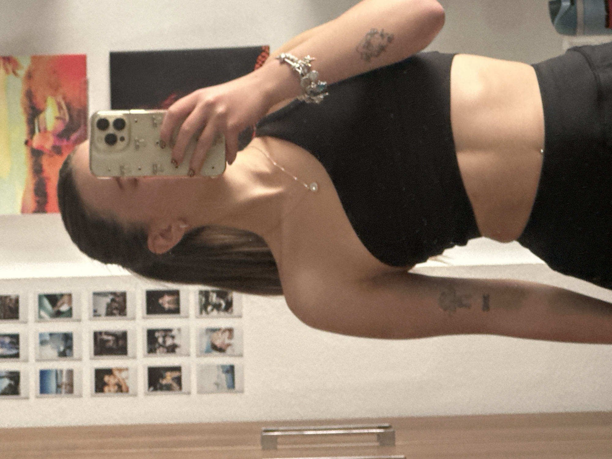 Woman takes mirror selfies in decorated room in Mexico
