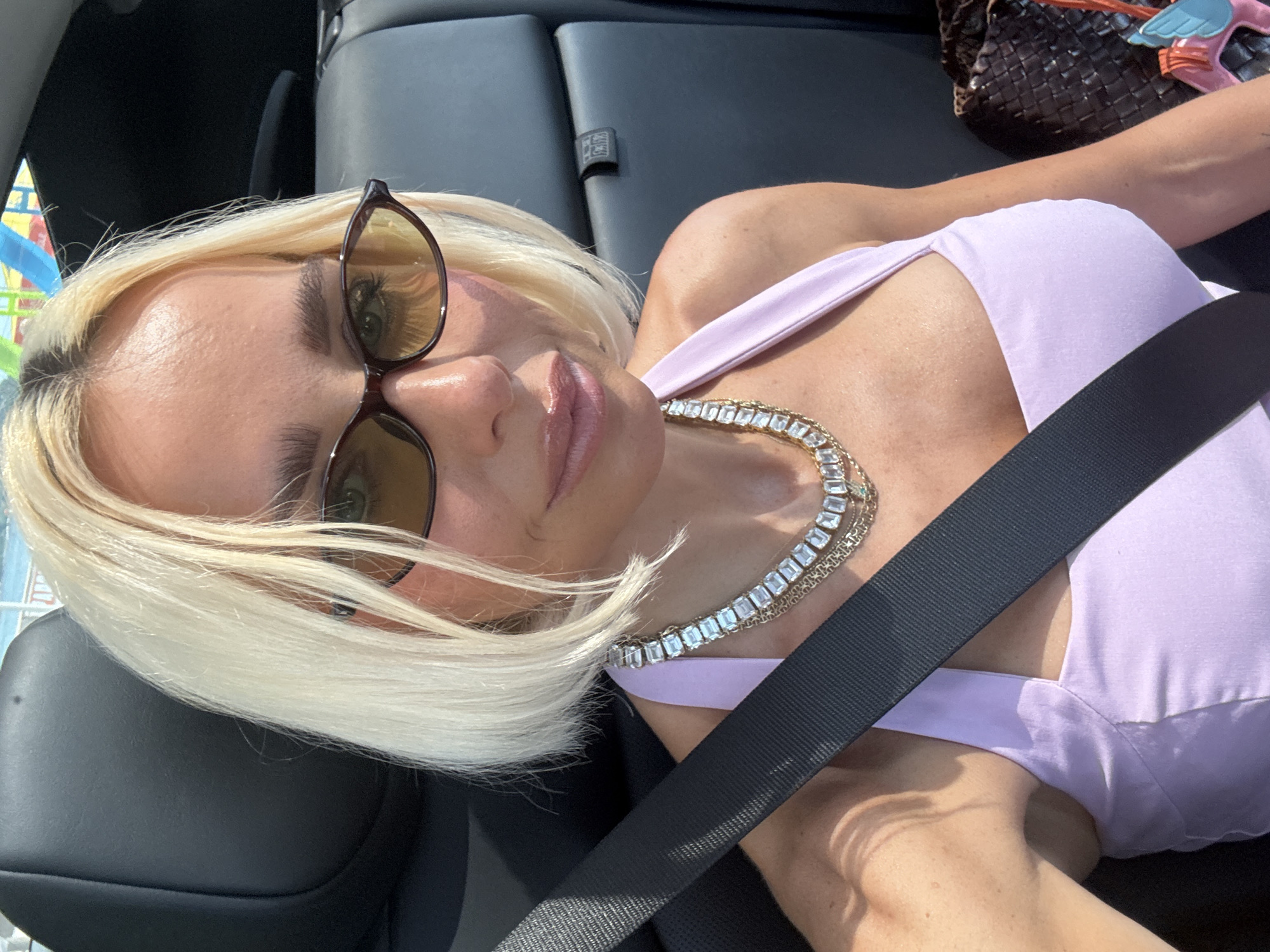 Taking a backseat rest in Cannes, seatbelt on
