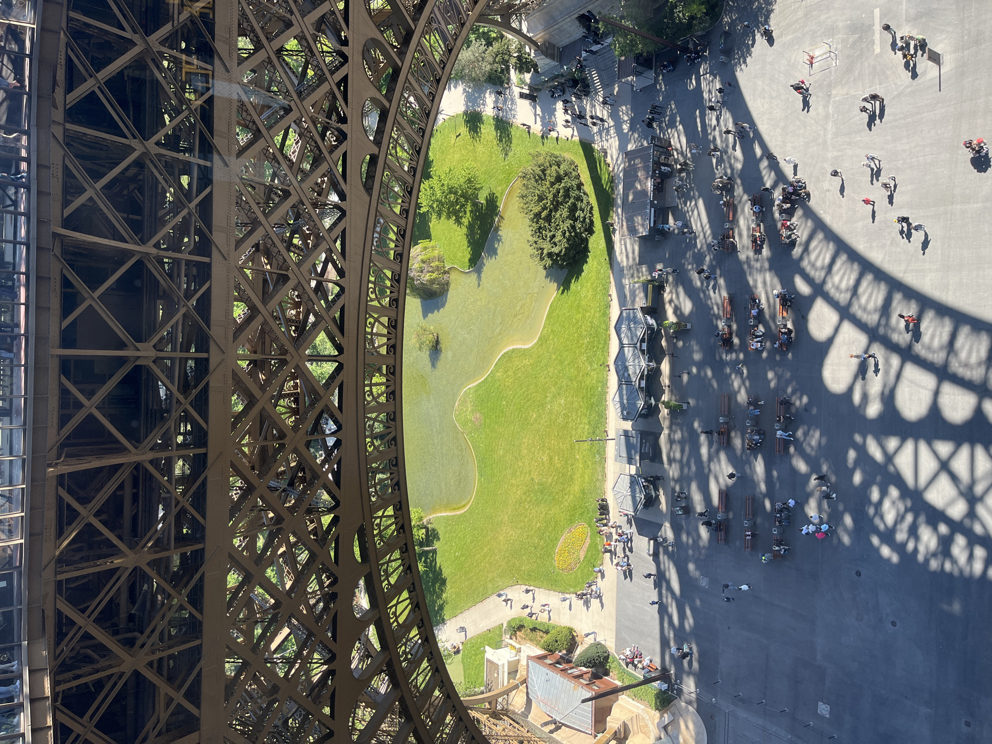 Overhead view captured from inside Eiffel Tower structure