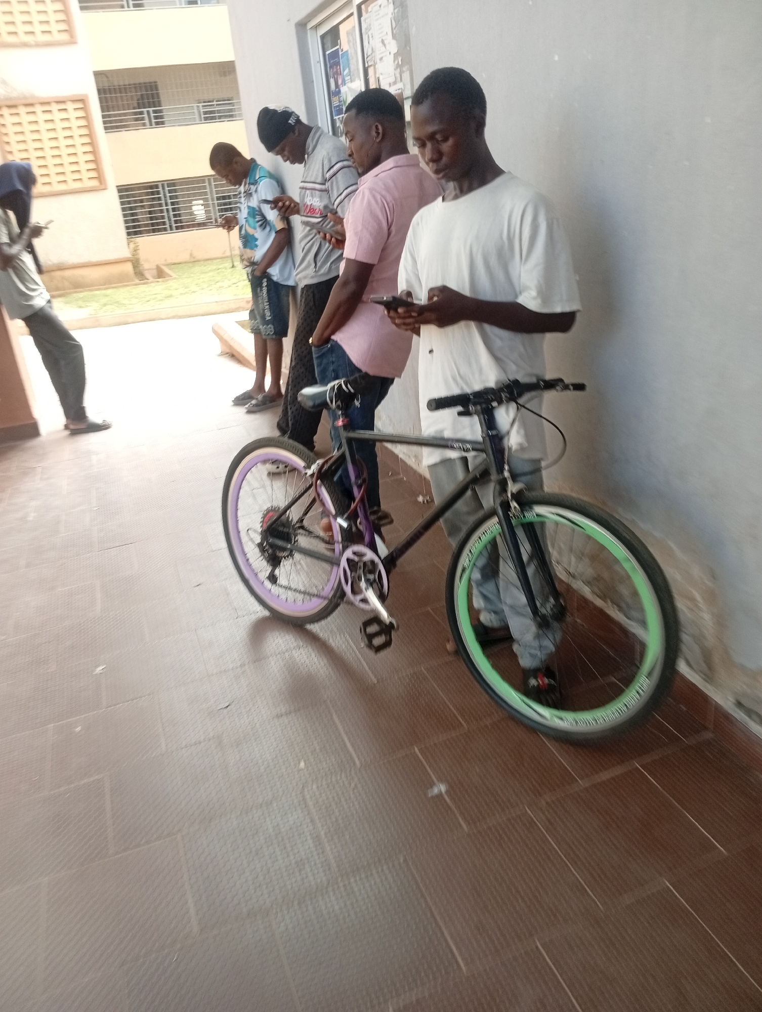 Everyday street life across Jos and Rafin Par, late afternoon