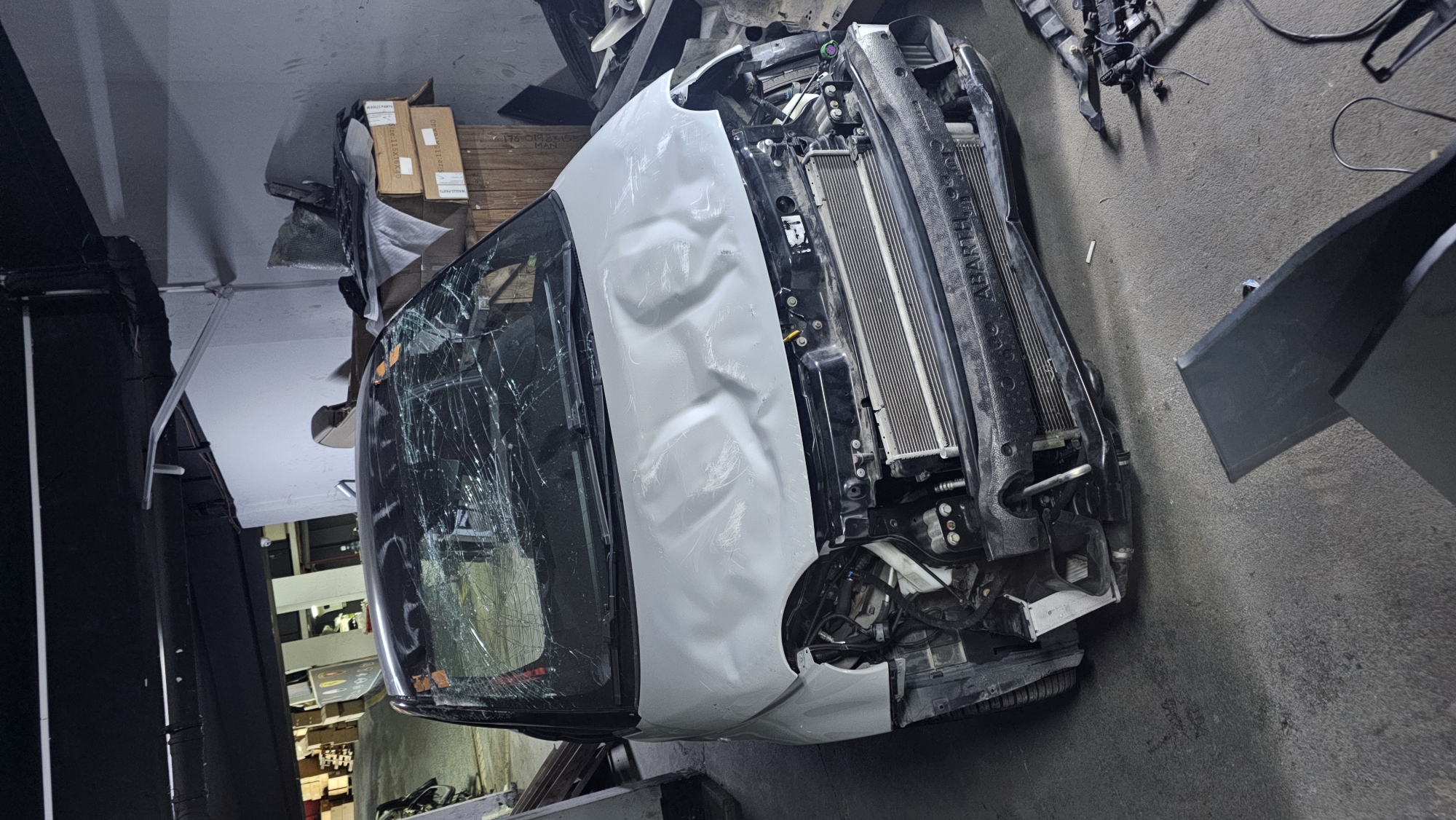 High-end vehicles in various stages of repair, Ataşehir workshop