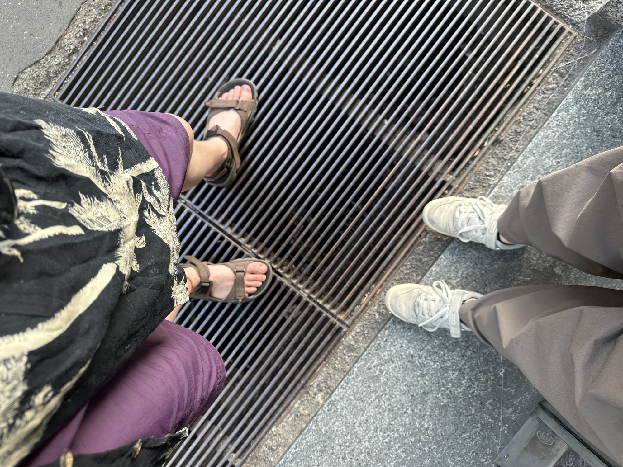 Two people photographed from different angles in Milan