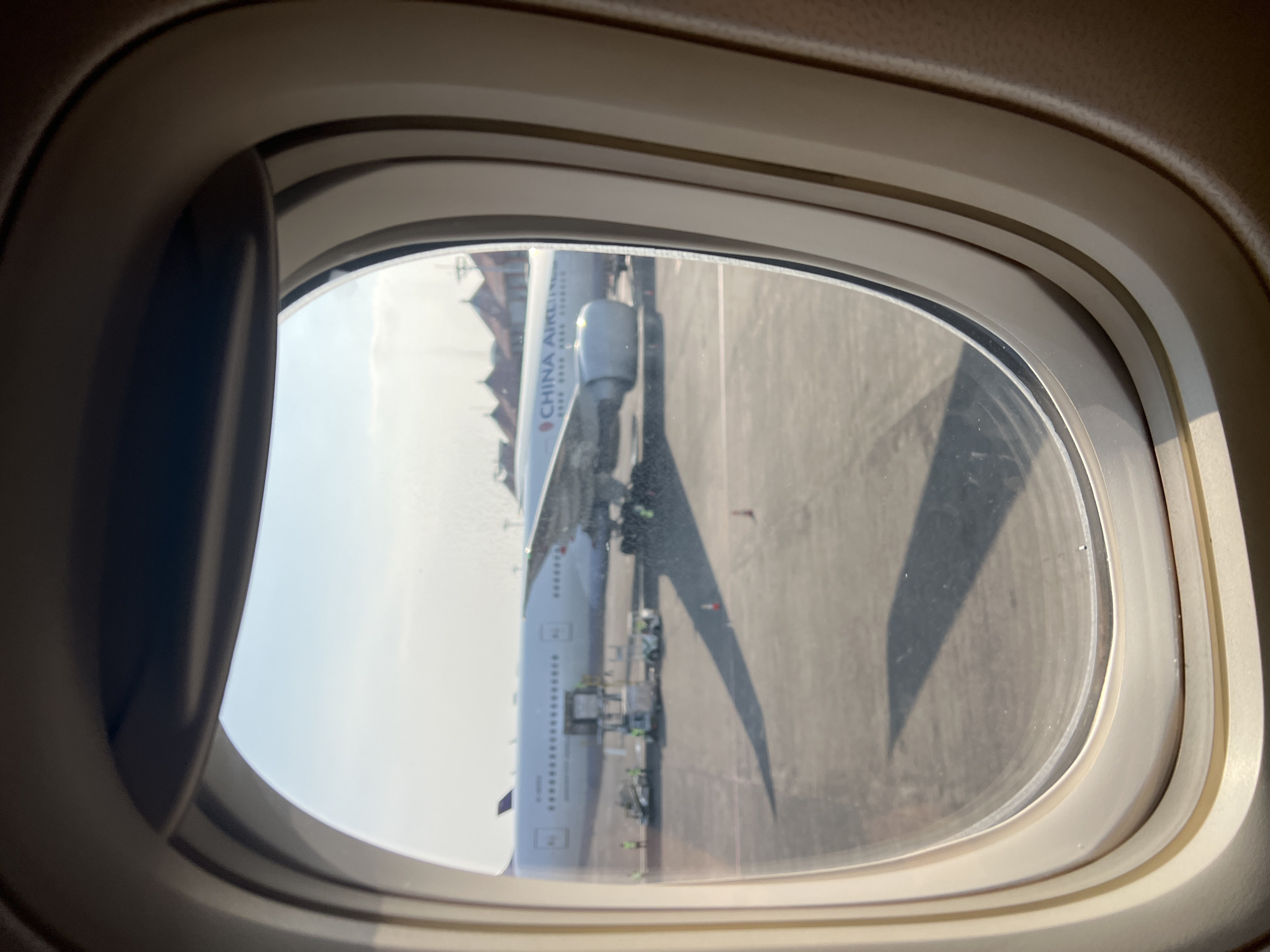 Ground operations and terminal views at Bali's DPS airport