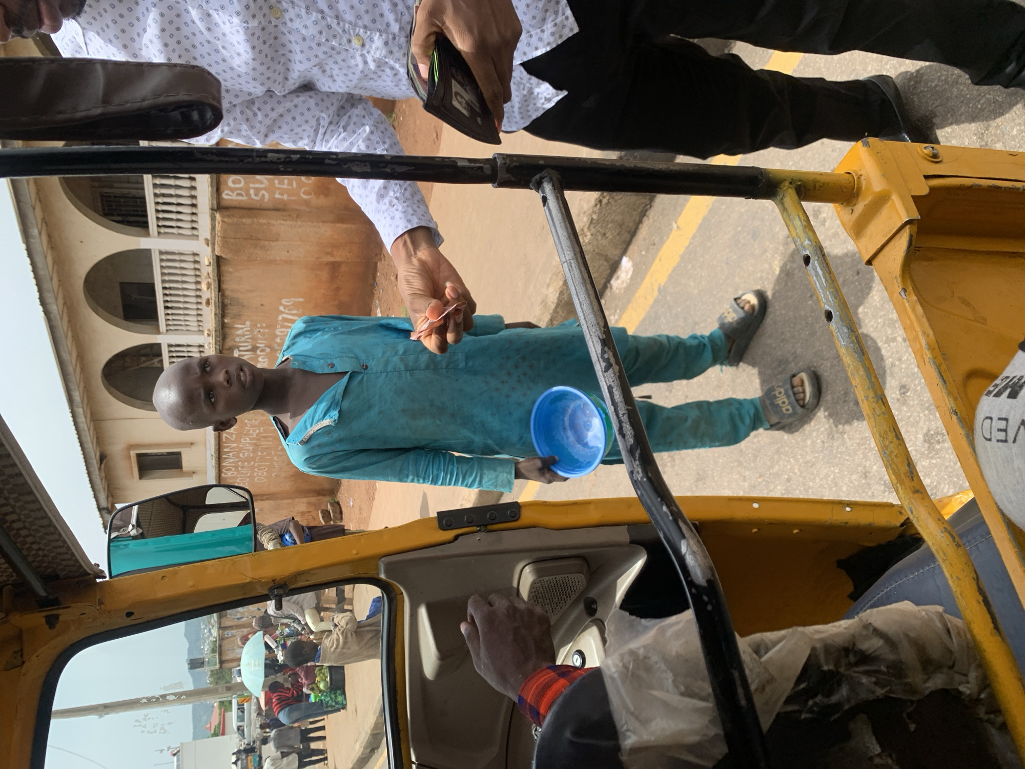 Everyday scenes from a Jos morning, indoors and out