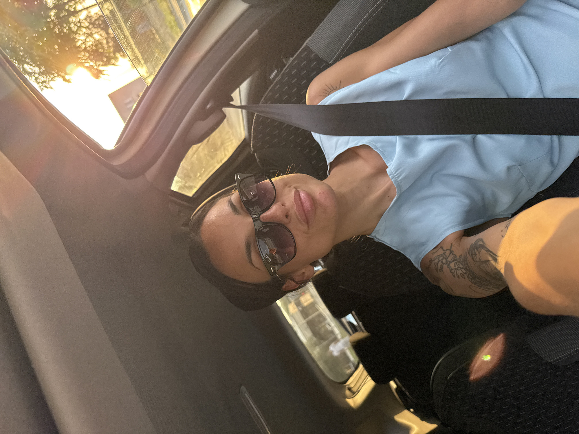 Through Pleven streets in a black car, mid-afternoon