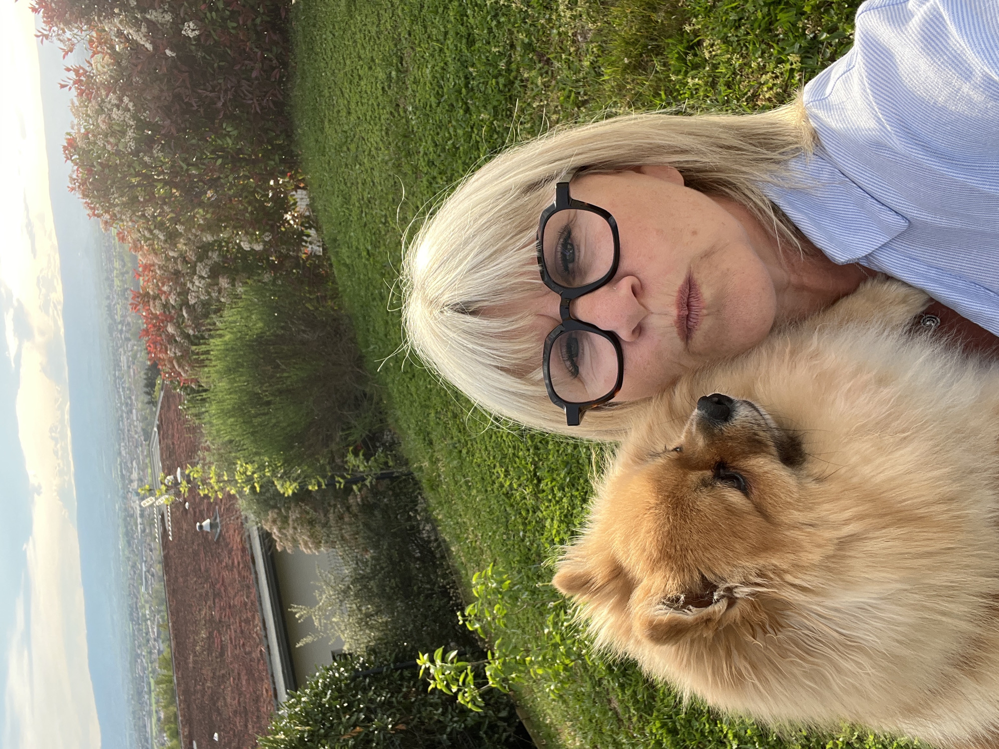 Woman takes selfies with dog in Chambœuf, France