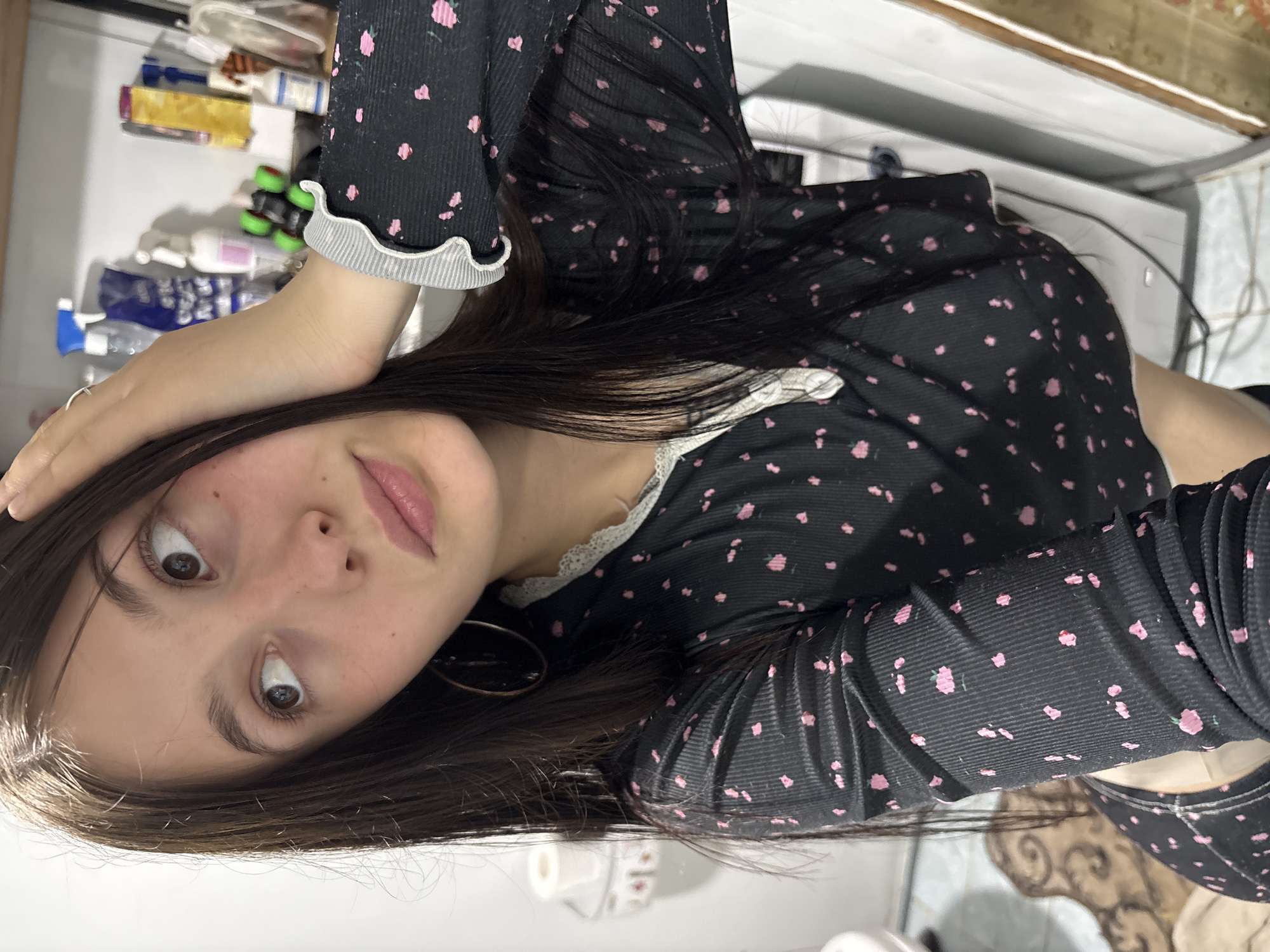 Young woman documents evening moments through selfies in Фоки, Russia