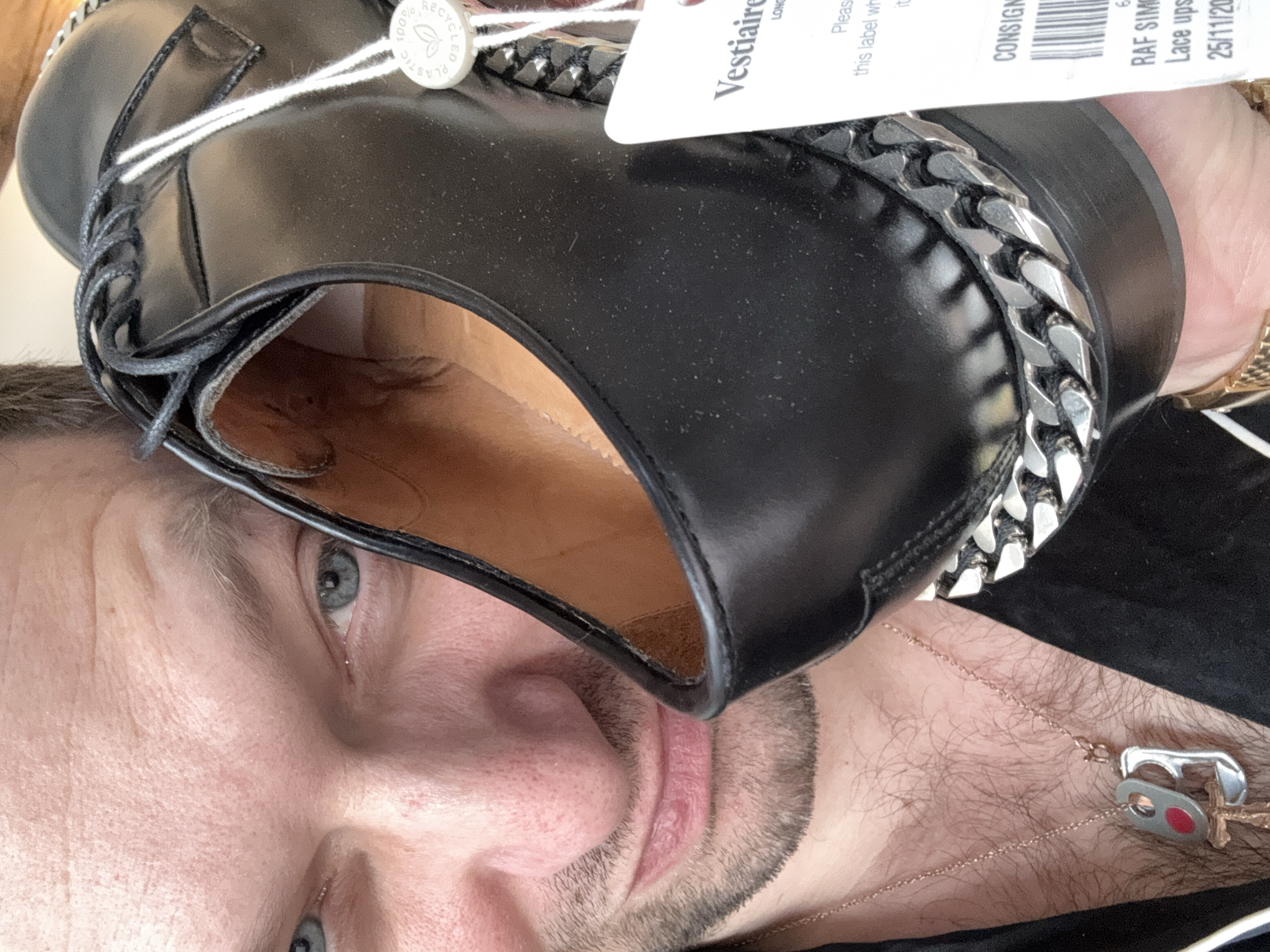 Designer shoe unboxing documented in Erba, Italy
