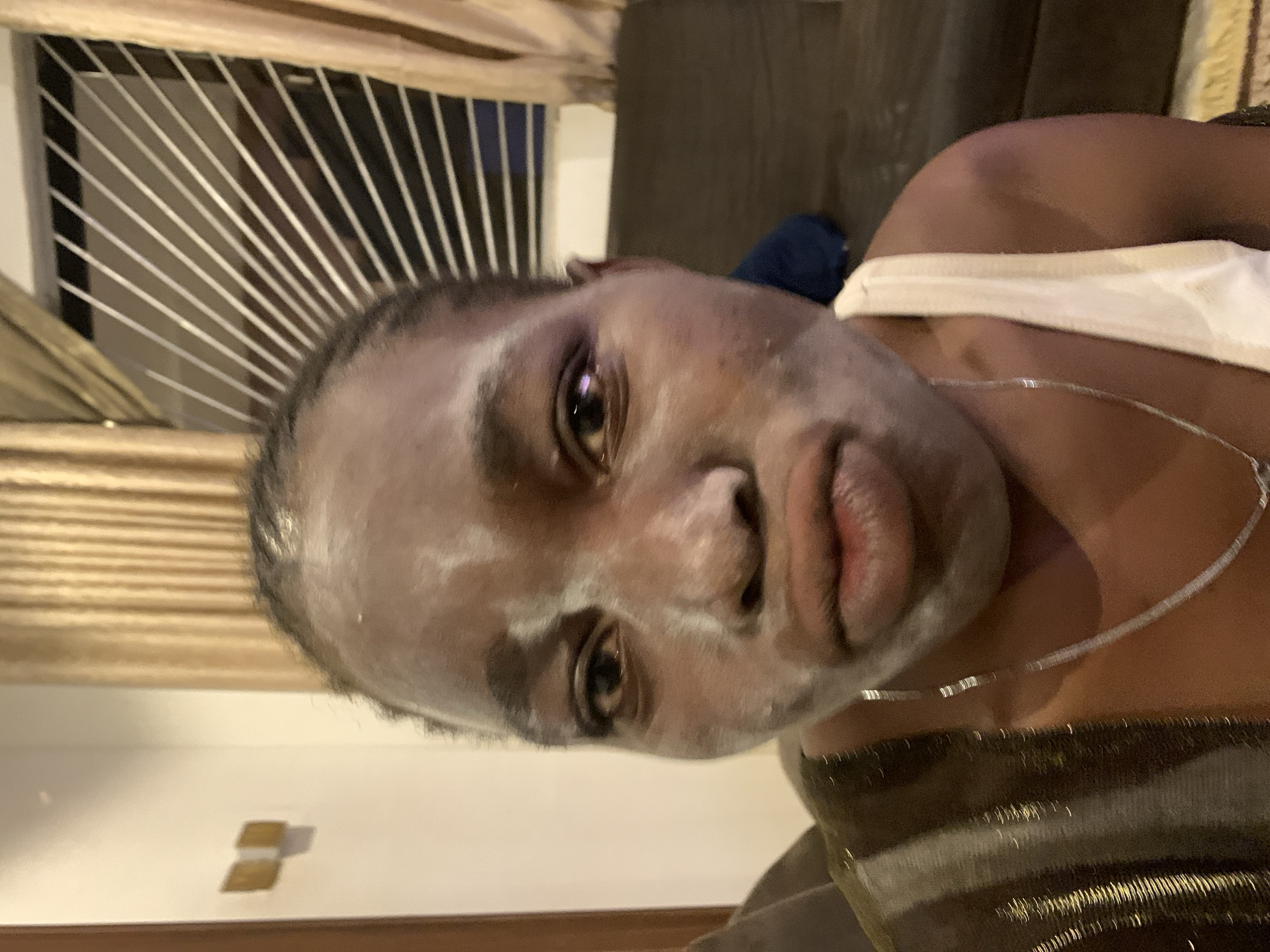 Woman documents skincare routine with facial mask in Jos